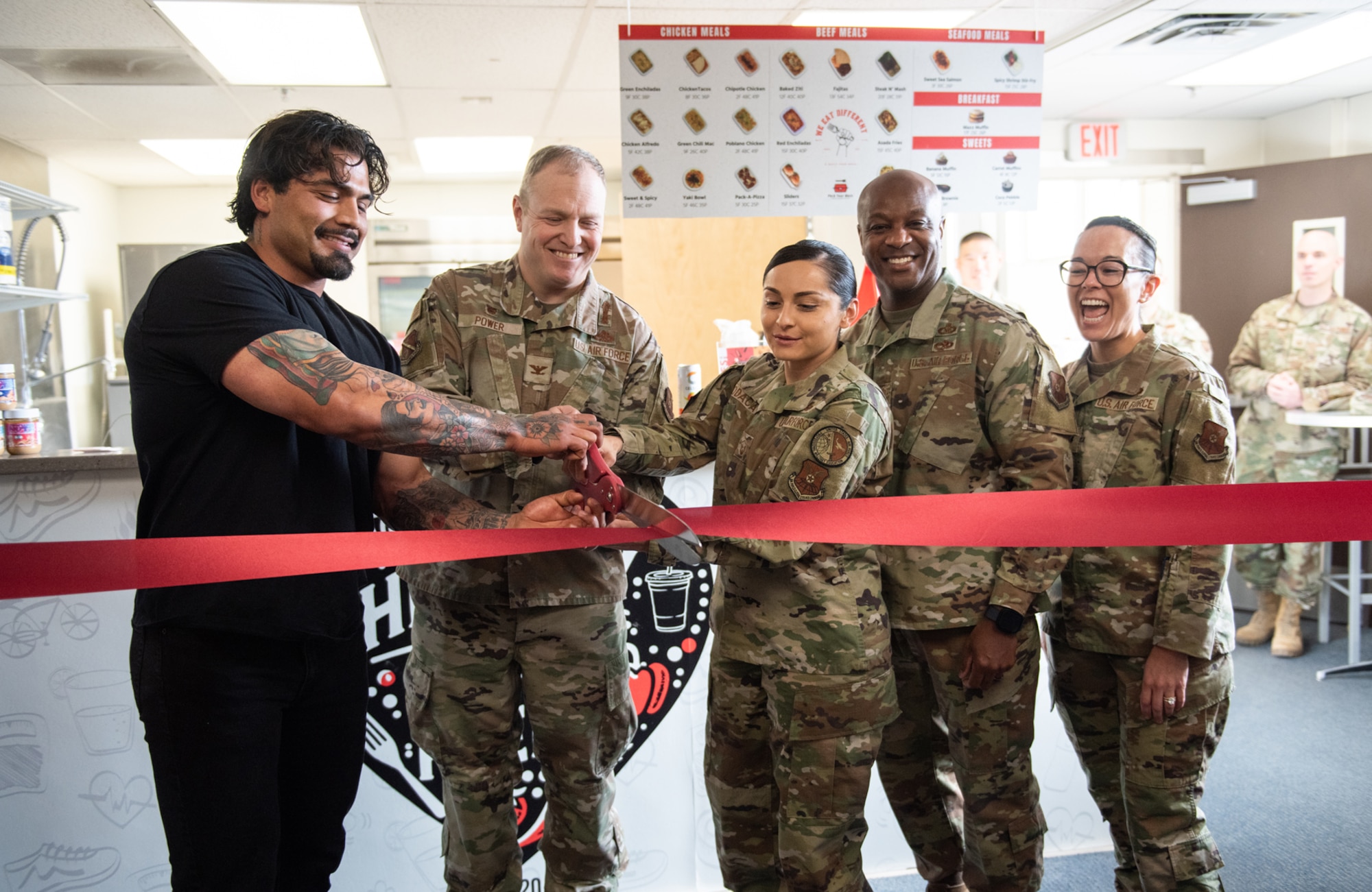 Leadership cutting a ribbon