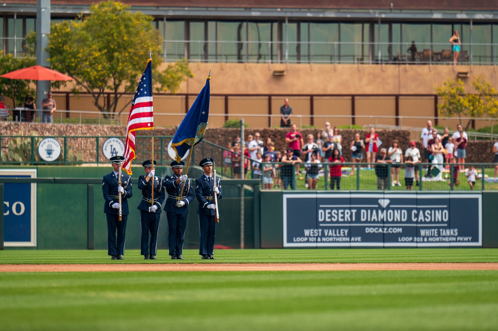 U.S. Air Force Honor Guardsmen assigned to the 56th Fighter Wing present the colors during the 2025 Military Appreciation game, Mar. 23, 2025 at the Camelback Ranch baseball complex, Glendale, Arizona.