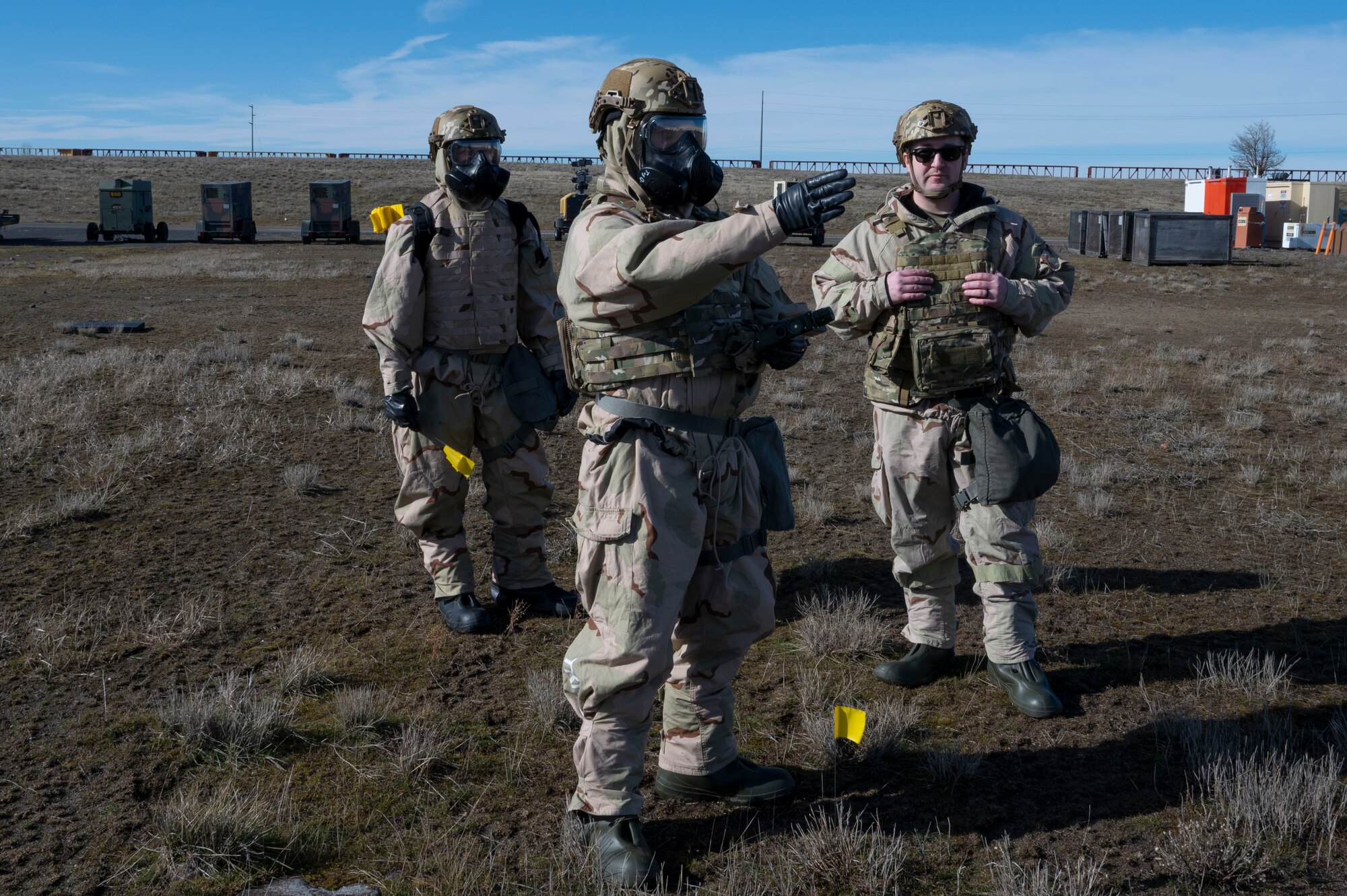 U.S. Air Force Airmen assigned to the 92nd Civil Engineer Squadron conduct a five-point survey to identify a simulated contaminated area during training at Fairchild Air Force Base, Washington, Feb. 22, 2025. Chemical, biological, radiological, and nuclear defense specialists ensure unit readiness by conducting and overseeing all aspects of CBRN defense training, from detection and identification to decontamination and first aid. (U.S. Air Force photo by Airman 1st Class Samantha Thorn)