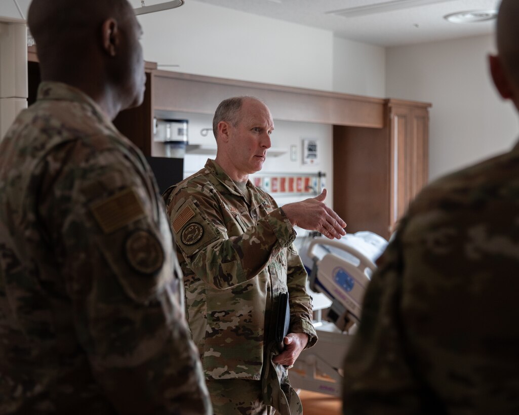 U.S. Air Force Lt. Gen. Stephen Jost, center, Commander, U.S. Forces Japan, and a Texas native, speaks with leadership at the Naval Family Branch Clinic Iwakuni during a tour of Marine Corps Air Station Iwakuni, Japan, March 10, 2025. The COMUSFJ visited MCAS Iwakuni to better understand the air station’s commitment to the U.S.-Japan alliance and military readiness. (U.S. Marine Corps photo by Cpl. Colin Thibault)