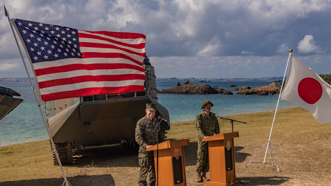 U.S. Marine Corps Brig. Gen. Trevor Hall, commanding general of the 3d Marine Expeditionary Brigade, left, and Japan Ground Self-Defense Force Maj. Gen. Hajime Kitajima, commander of the Amphibious Rapid Deployment Brigade, address press representatives during a press conference as part of Iron Fist 25, at Kin Blue Beach Training Area, Okinawa, Japan, Mar. 1, 2025. Iron Fist is an annual bilateral exercise designed to increase interoperability and strengthen the relationships between the U.S. Marine Corps, U.S. Navy, Japan Ground Self-Defense Force, Japan Maritime Self-Defense Force and Japan Air Self-Defense Force. The 31st MEU, the Marine Corps’ only continuously forward-deployed MEU, provides a flexible and lethal force, ready to perform a wide range of military operations as the premiere crisis response force in the Indo-Pacific region. (U.S. Marine Corps photo by Sgt. Tyler Andrews)