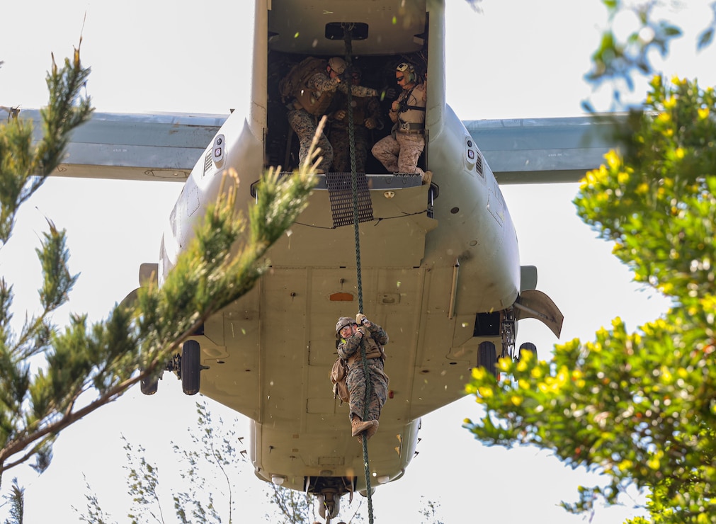U.S. Marines with Expeditionary Operations Training Group, III Marine Expeditionary Force fast-rope from an MV-22B Osprey onto Landing Zone Starling, Okinawa, Japan, March 19, 2025.