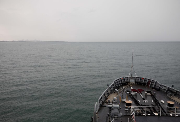 DARWIN, Northern Territory, Australia (Mar. 25, 2025) – Submarine tender USS Emory S. Land (AS 39) sails toward Darwin, Northern Territory, Australia, for a regularly scheduled port visit, Mar. 25, 2025. Darwin is Emory S. Land’s 17th port call since it departed on deployment May 17, 2024. Emory S. Land is on deployment supporting the U.S. 7th Fleet, the U.S. Navy’s largest forward deployed numbered fleet, operating with allies and partners in preserving a free and open Indo-Pacific region. (U.S. Navy photo by Mass Communication Specialist 1st Class Ian Zagrocki)