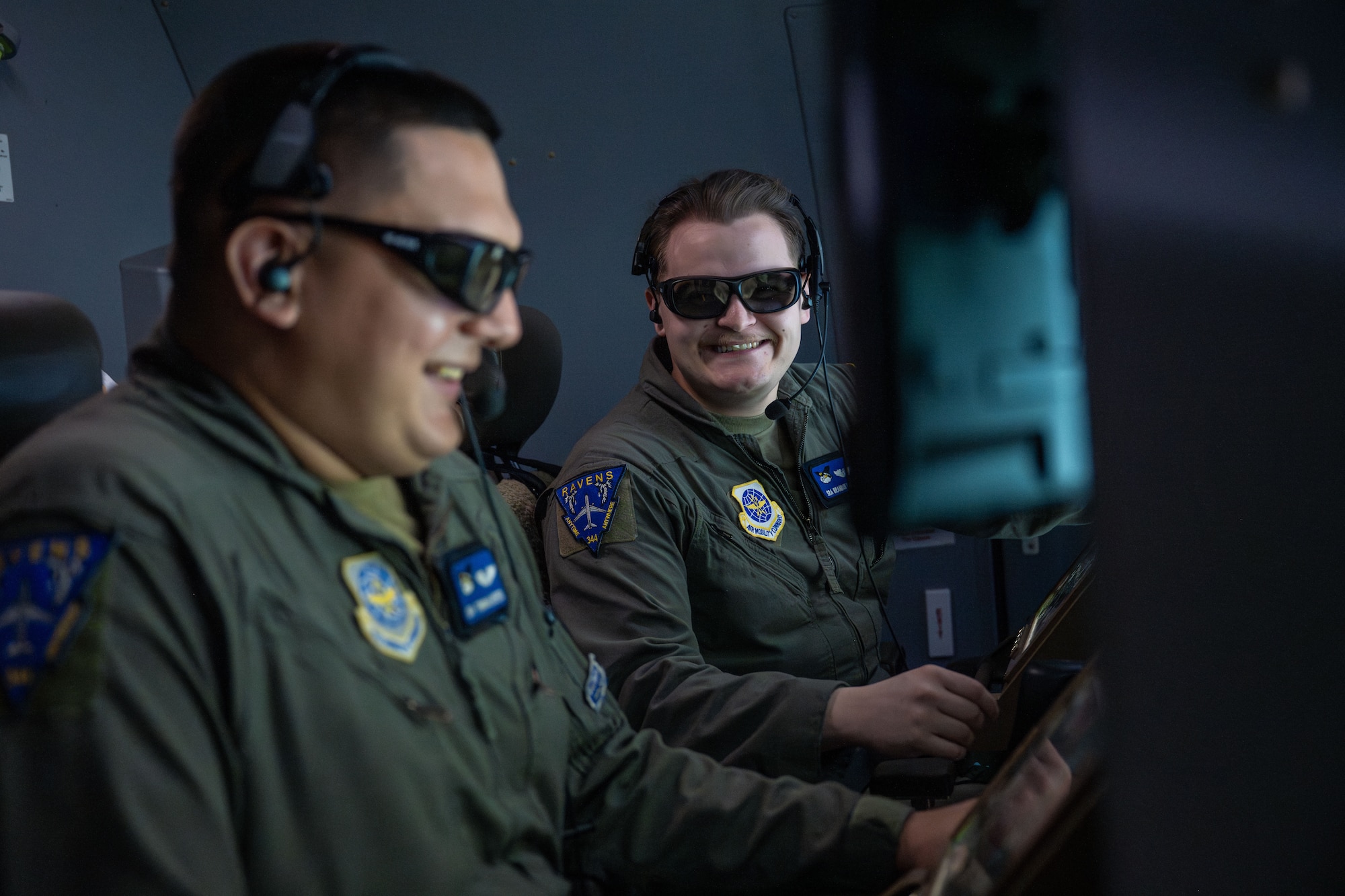 From left, Senior Airman Trinidad Reyes and Senior Airman Brandon McDowell, 344th Air Refueling Squadron boom operators, wait to refuel F-16 Fighting Falcons assigned to the 31 Fighter Wing, from inside a KC-46A Pegasus during exercise Fighting Wyvern 25-01 at Aviano Air Base, March 11, 2025. The 22nd Air Refueling Wing delivered approximately 200 thousand pounds of fuel to 73 receiving aircraft during Fighting Wyvern. (U.S. Air Force photo by Airman 1st Class Paula Arce)