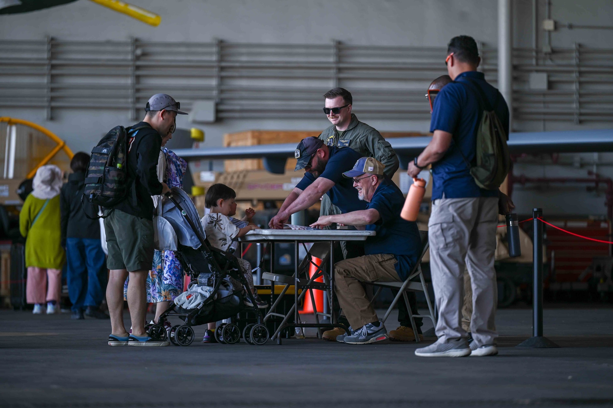 Civilian retirees talking to guests