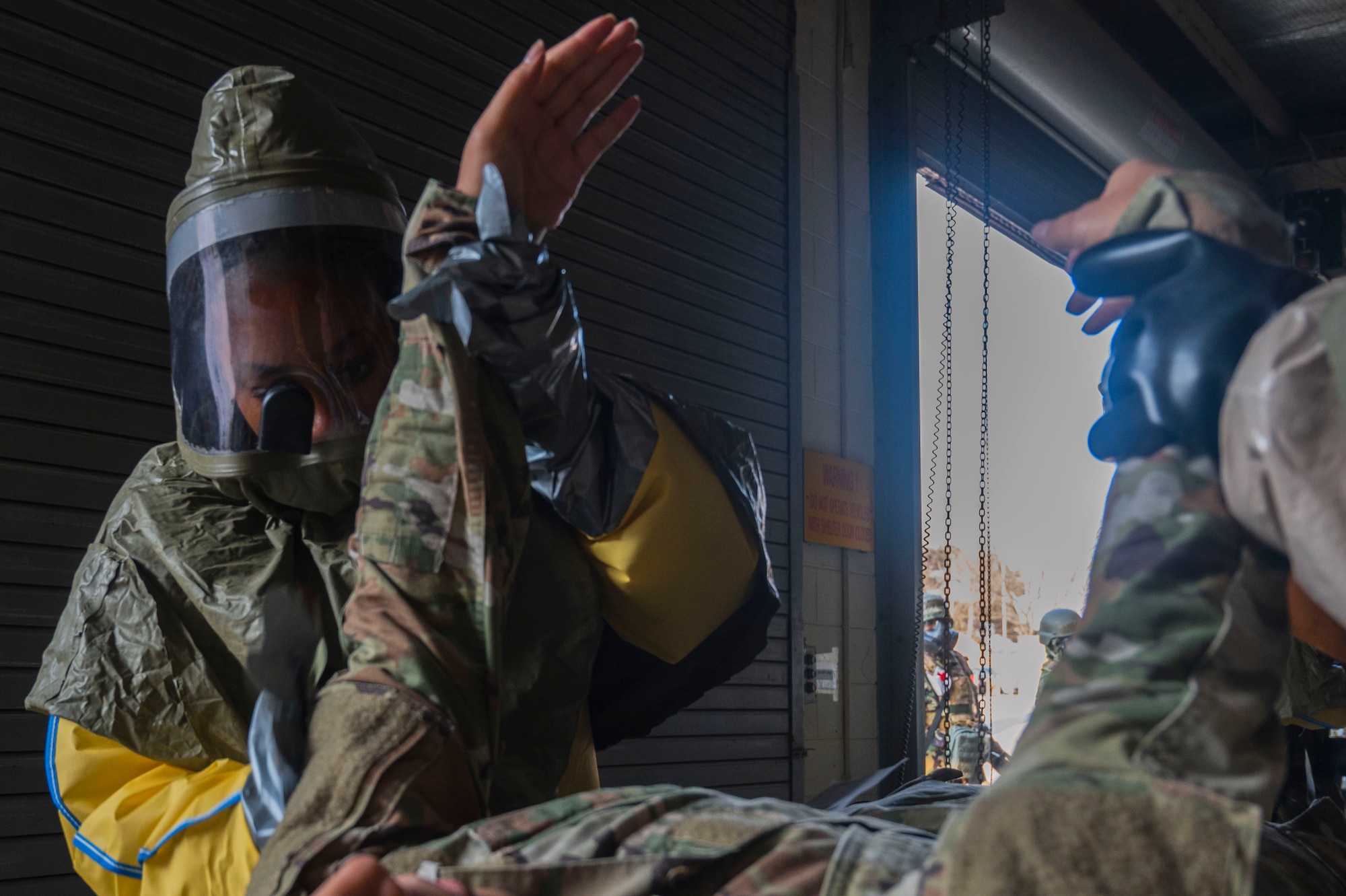 U.S. Air Force Staff Sgt. Kayla Britford, 8th Operational Medical Squadron physical therapy technician, conducts decontamination procedures during exercise Freedom Shield 25.