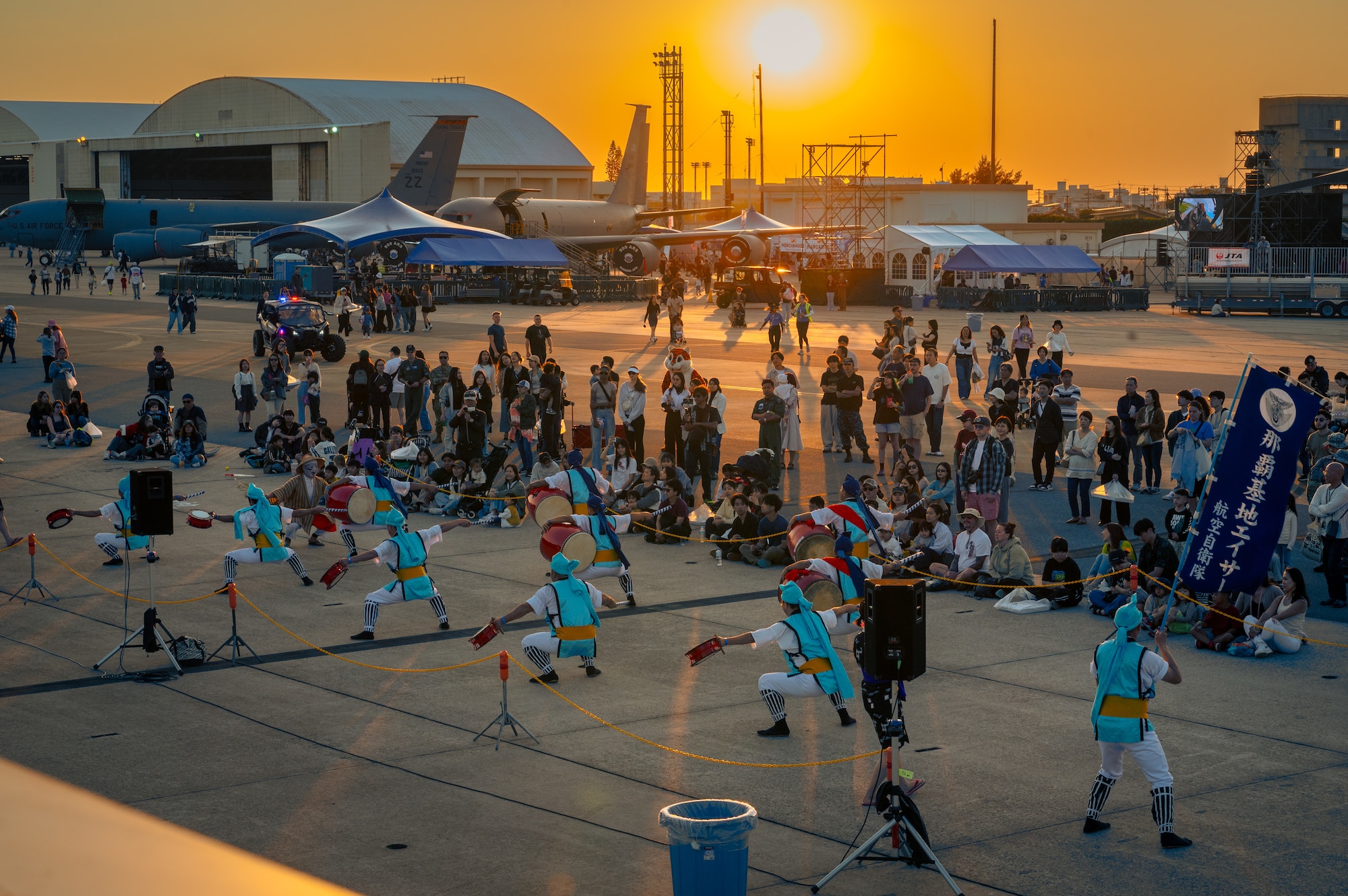 A group of people are watching a traditional dance.