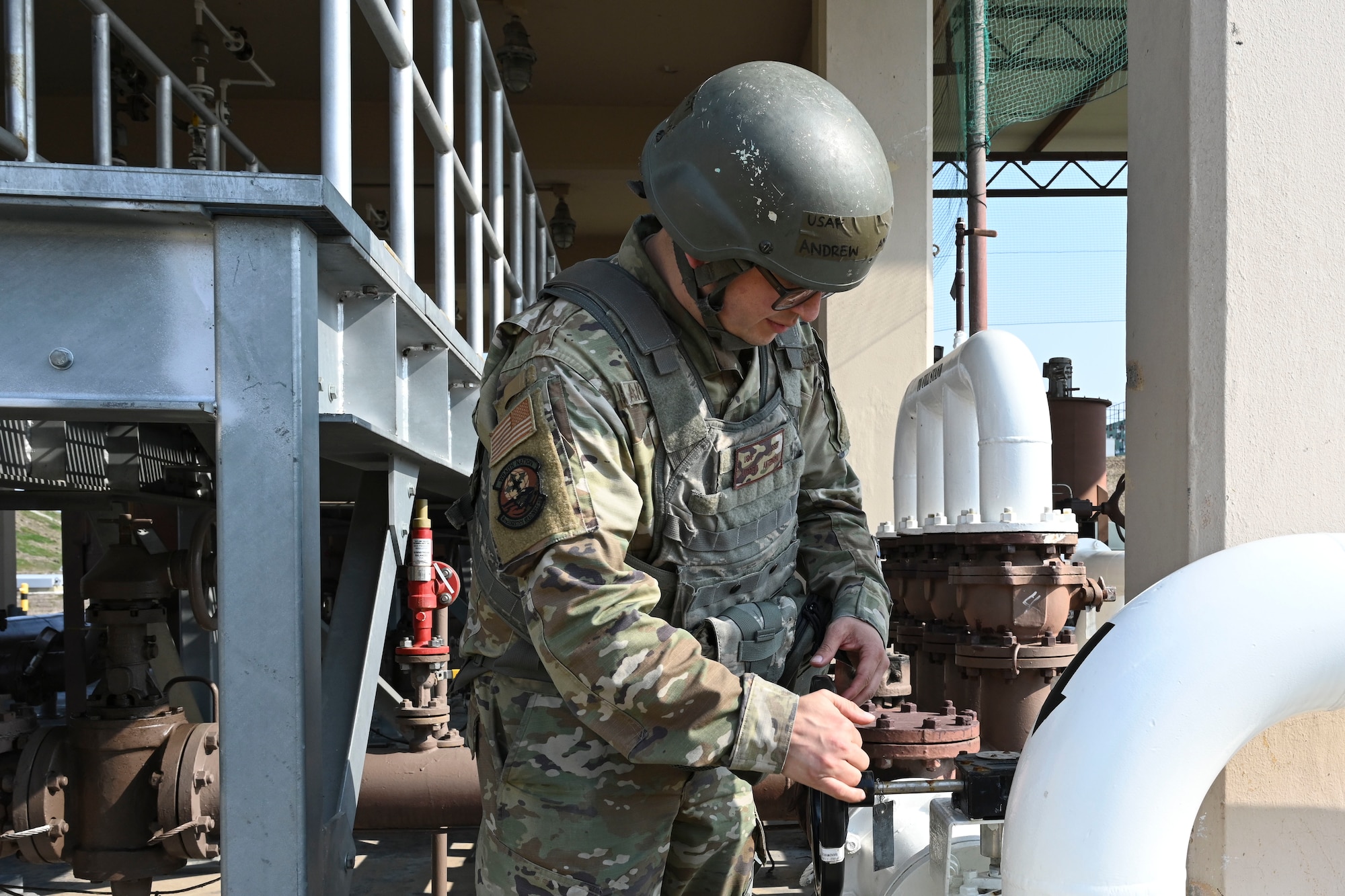 U.S. Air Force Staff Sgt. Andrew Antepara, 8th Logistics Readiness Squadron petroleum, oils, and lubricant fuels mobile distribution supervisor, opens fuel lines at the pump house during Freedom Shield 25 at Gwangju Air Base, Republic of Korea.