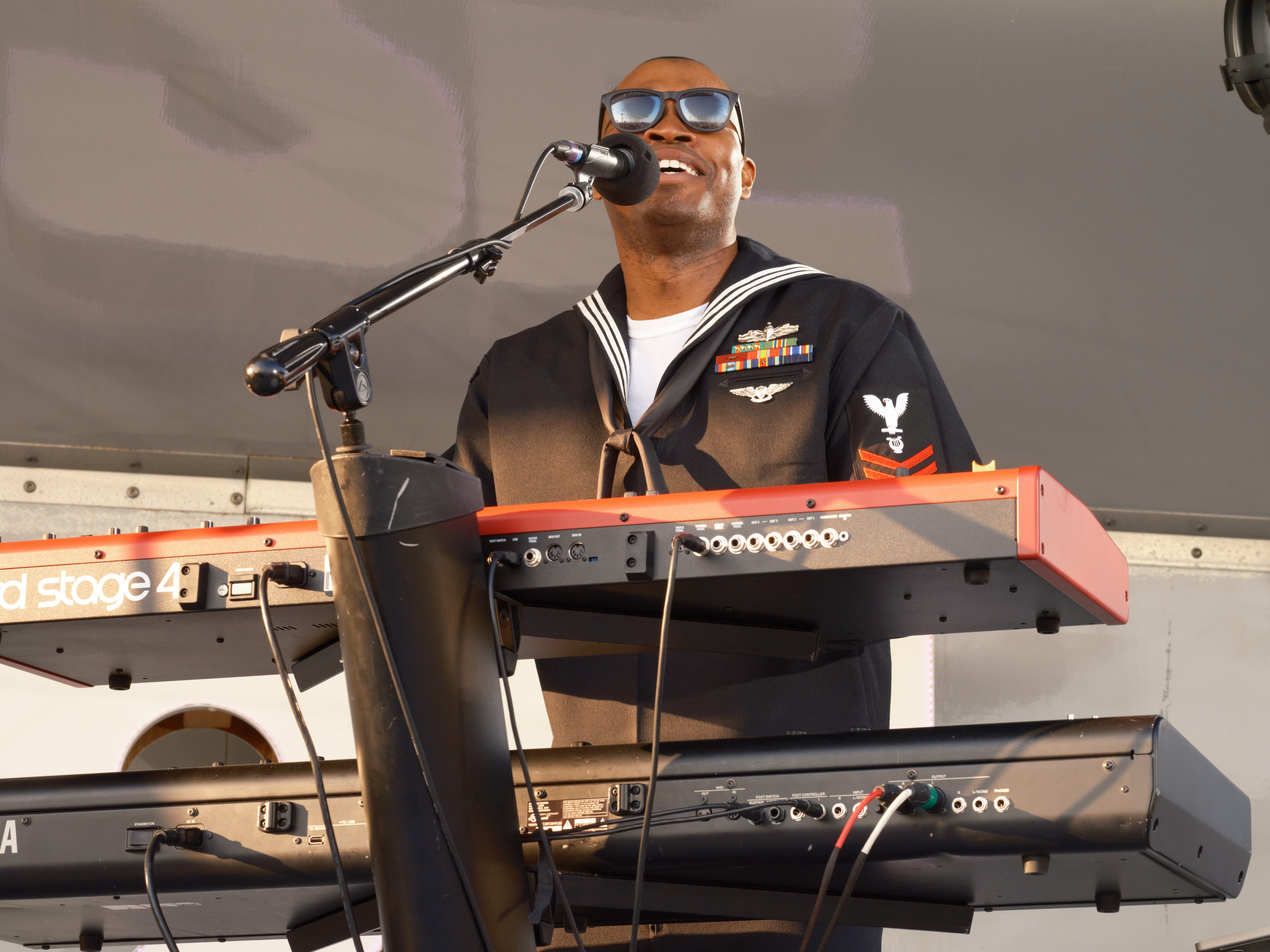 Musician 1st Class Brian Mathis of the 7th Fleet Band's Orient Express performs at the 29th Annual Yokosuka Spring Festival at Commander, Fleet Activities Yokosuka's (CFAY) Berkey Field March 22, 2025.
