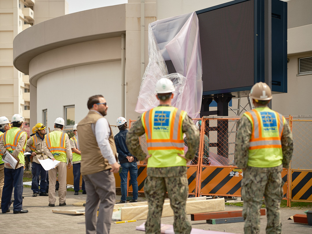 Commander, Fleet Activities Yokosuka (CFAY), Naval Facilities Command Far East (NAVFAC), and Defense Logisitics Agency (DLA)-contracted personnel began setting up a new LED display outside the Community Readiness Center Monday, March 24, 2025.