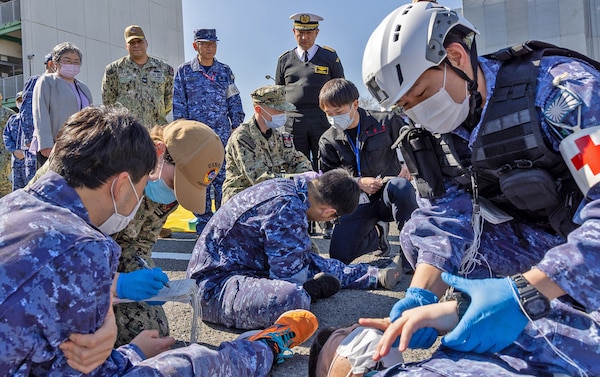 TAURA, Japan (Feb 27, 2025) Japan Self-Defense Force (JSDF) Hospital Yokosuka and U. S. Navy Medicine Readiness and Training Command (NMRTC) Yokosuka personnel conduct triage operations during a joint disaster response drill. The exercise focused on enhancing hospital administrative and command staff capabilities between NMRTC Yokosuka and JSDF Hospital Yokosuka in the event of a large-scale natural disaster, such as a major earthquake. It also provided an opportunity for U.S. and Japanese medical teams to improve emergency response capabilities through collaborative triage and surgical training. (U.S. Navy photo by Daniel Taylor/USNMRTC Yokosuka Public Affairs)