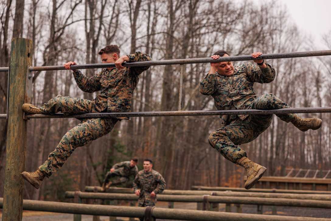 Students with the Force Fitness Instructor Course conduct the obstacle course evaluation at The Basic School on Marine Corps Base Quantico, Virginia, March 14, 2025. Marines go through a seven-week long Force Fitness Instructor Course allowing Marines to learn how to lead workouts safely and effectively by following a fitness regimen that is designed specifically to meet a unit’s fitness goals and needs. (U.S. Marine Corps photo by Lance Cpl. Braydon Rogers)