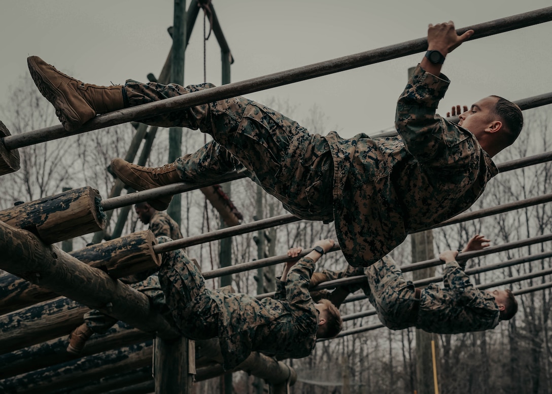 Students with the Force Fitness Instructor Course conduct the obstacle course evaluation at The Basic School on Marine Corps Base Quantico, Virginia, March 14, 2025. Marines go through a seven-week long Force Fitness Instructor Course allowing Marines to learn how to lead workouts safely and effectively by following a fitness regimen that is designed specifically to meet a unit’s fitness goals and needs. (U.S. Marine Corps photo by Lance Cpl. Harleigh Faulk)