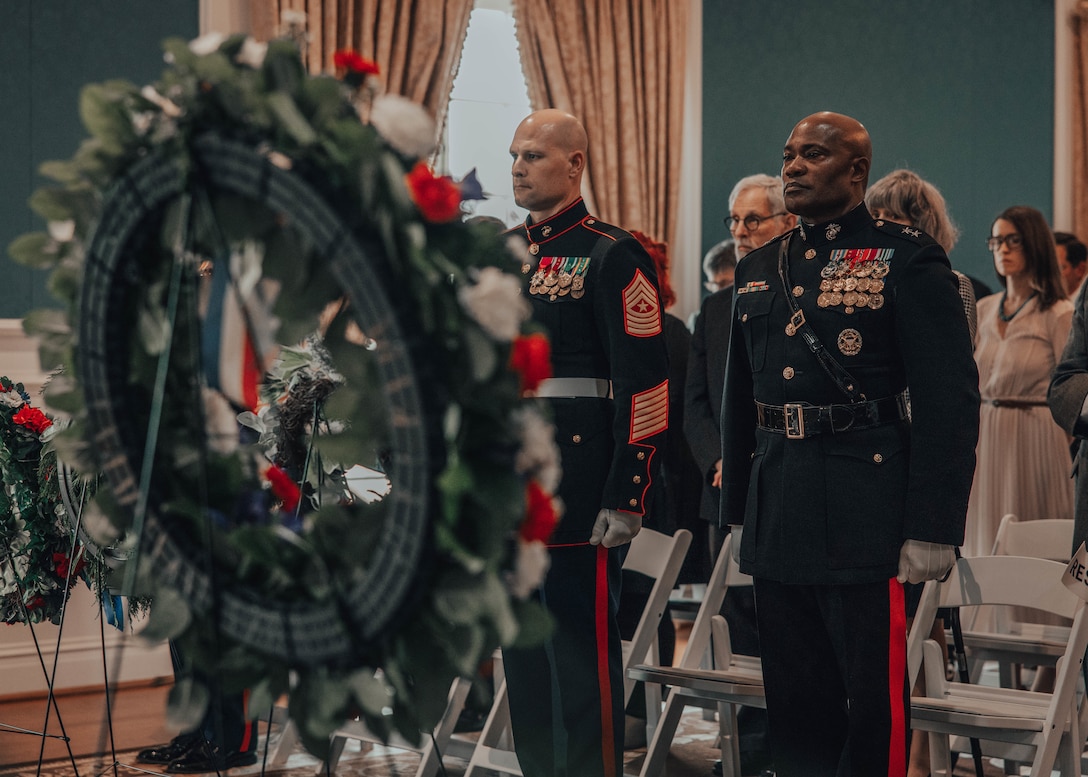 U.S. Marine Corps Maj. Gen. Anthony Henderson, right, commanding general, Training Command and Sgt. Maj. David Elliot with TECOM at Marine Corps Base Quantico stand at attention during the wreath laying ceremony in honor of former President James Madison at the visitor center complex at Montpelier, Orange, Virginia, March 16, 2025. This ceremony was held in commemoration of the 274th anniversary of the birthdate of the fourth president of The United States, President James Madison who contributed to the producing of the Constitution of the United States of America and authoring the Bill of Rights. (Marine Corps photo by Lance Cpl. Harleigh Faulk)