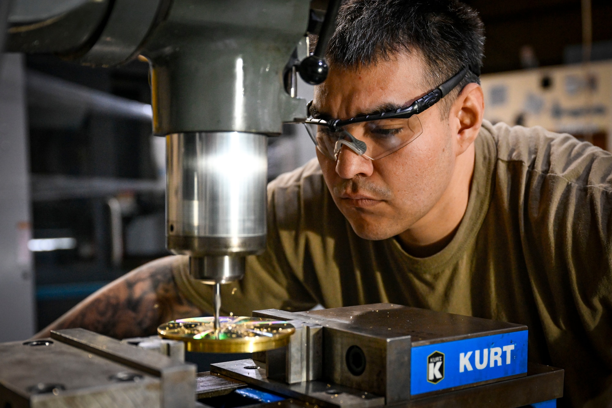 An Airman conducts mill machinery training.