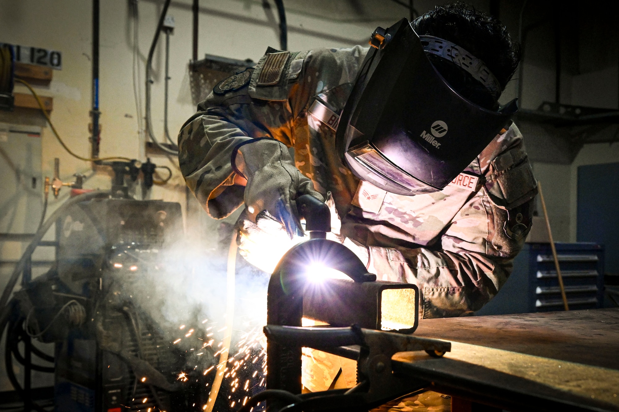 An Airman performs welding.