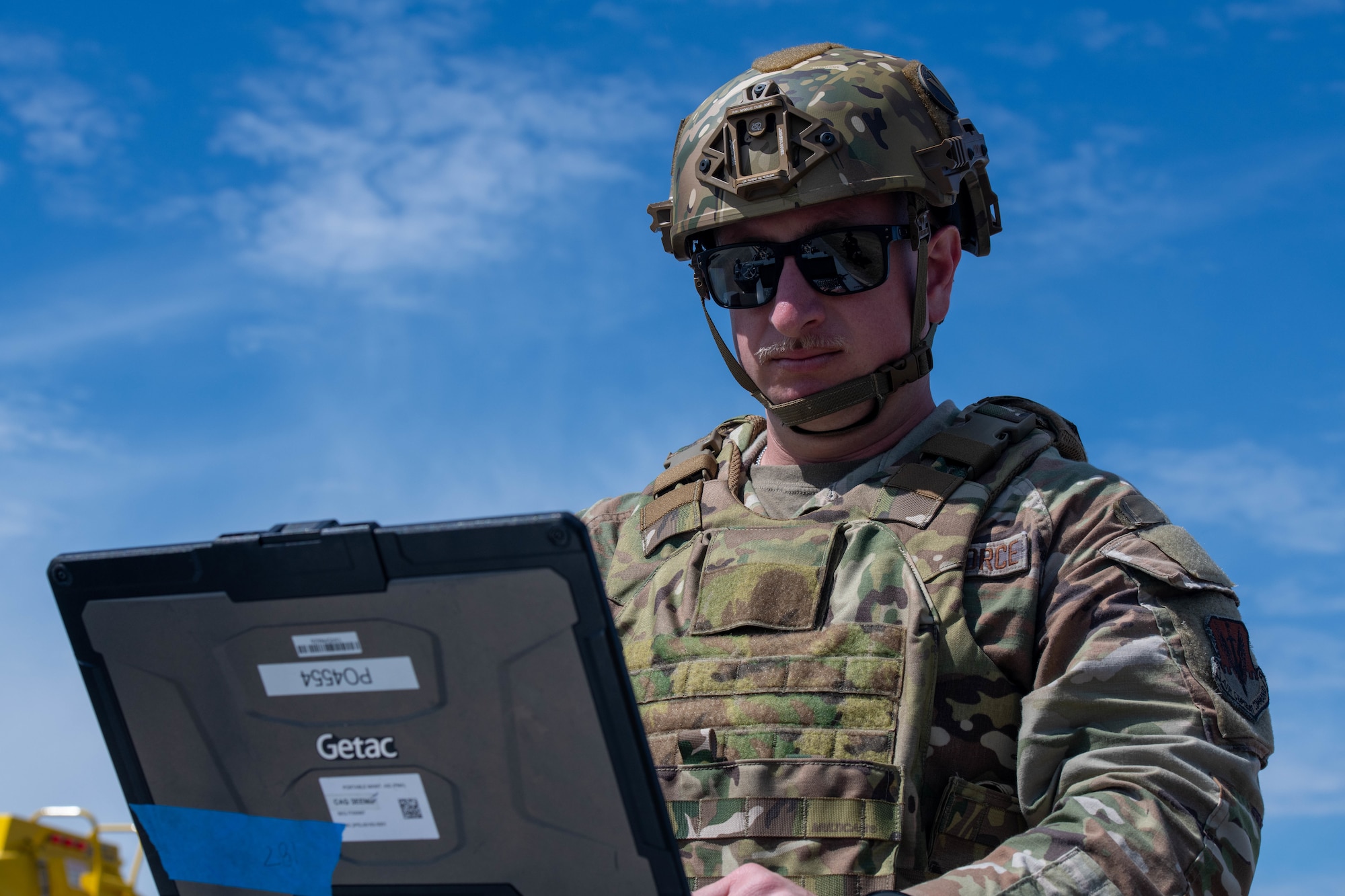 An Airman works on the flightline