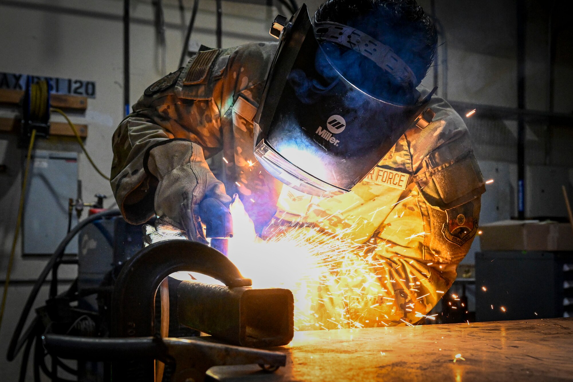 An Airman performs welding.