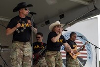 band members on stage singing