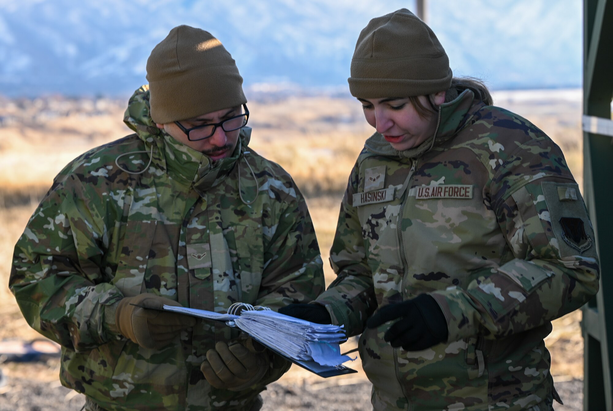 U.S. Air Force Airmen with the 729th Air Control Squadron review deployment documentation at Hill Air Force Base, Utah, Jan. 13, 2025. The 729th ACS conducted a full-scale readiness exercise in preparation for Red Flag and Bamboo Eagle.
(U.S. Air Force photo by Garrett N. Cole)