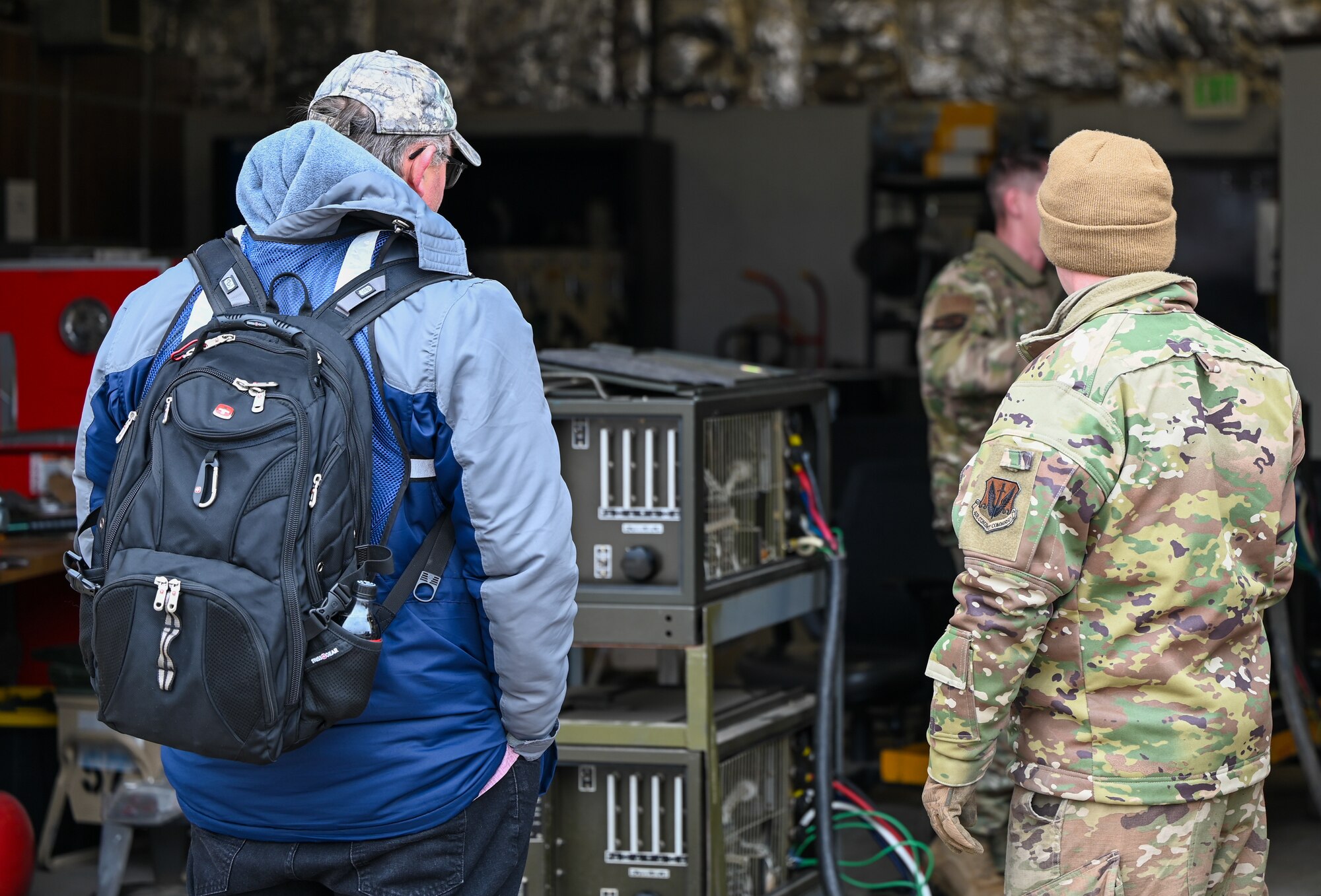 Airmen with the 729th Air Control Squadron review power distribution systems with a civilian evaluator during a deployment readiness exercise at Hill Air Force Base, Utah, Jan. 13, 2025. The assessment was part of a larger inspection ensuring equipment met mission readiness standards.
(U.S. Air Force photo by Garrett N. Cole)