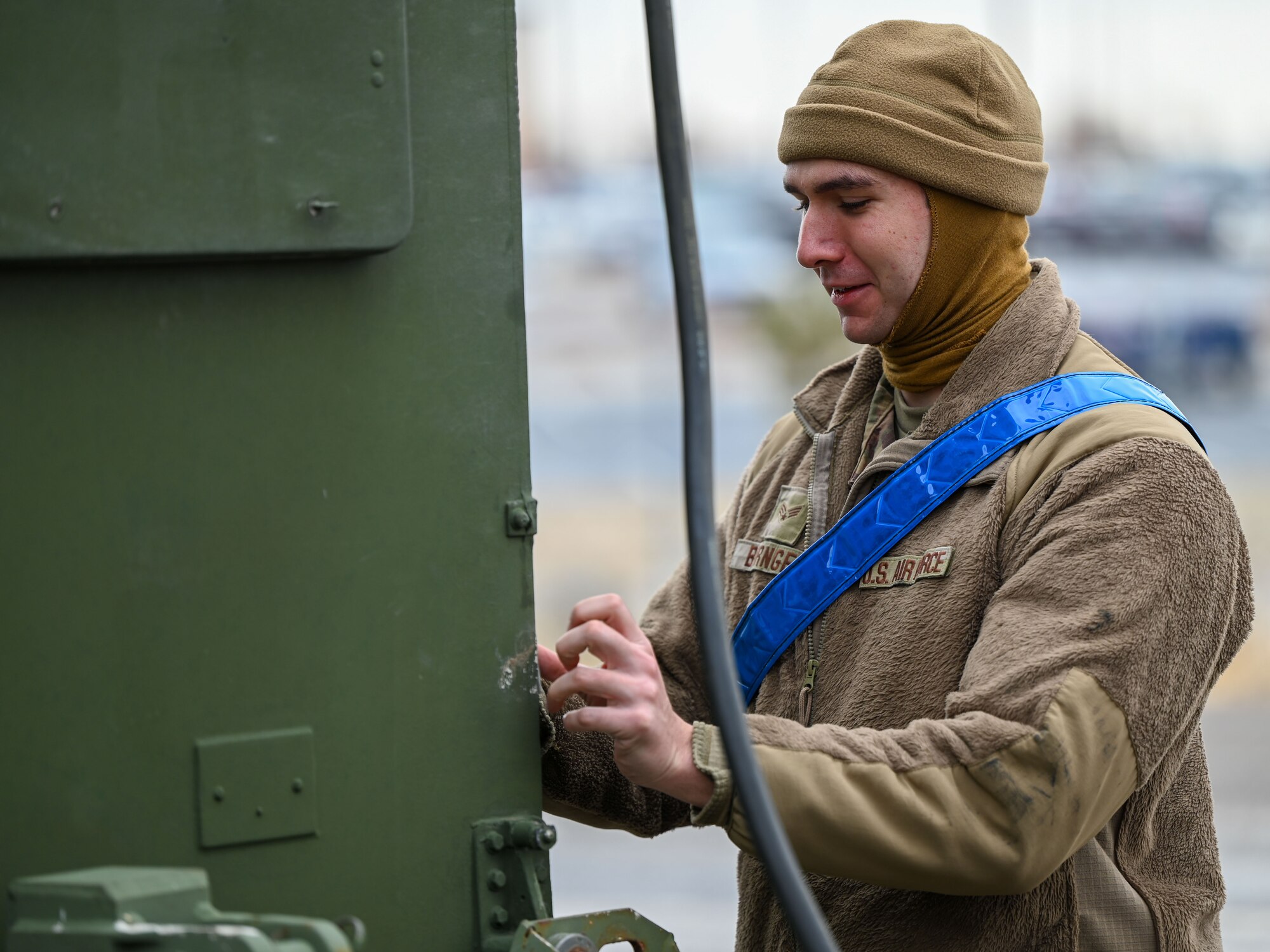 An Airman from the 729th Air Control Squadron secures a communications cable during a deployment readiness exercise at Hill Air Force Base, Utah, Jan. 13, 2025. Equipment checks like these are essential for ensuring communications remain operational in deployed environments.
(U.S. Air Force photo by Garrett N. Cole)