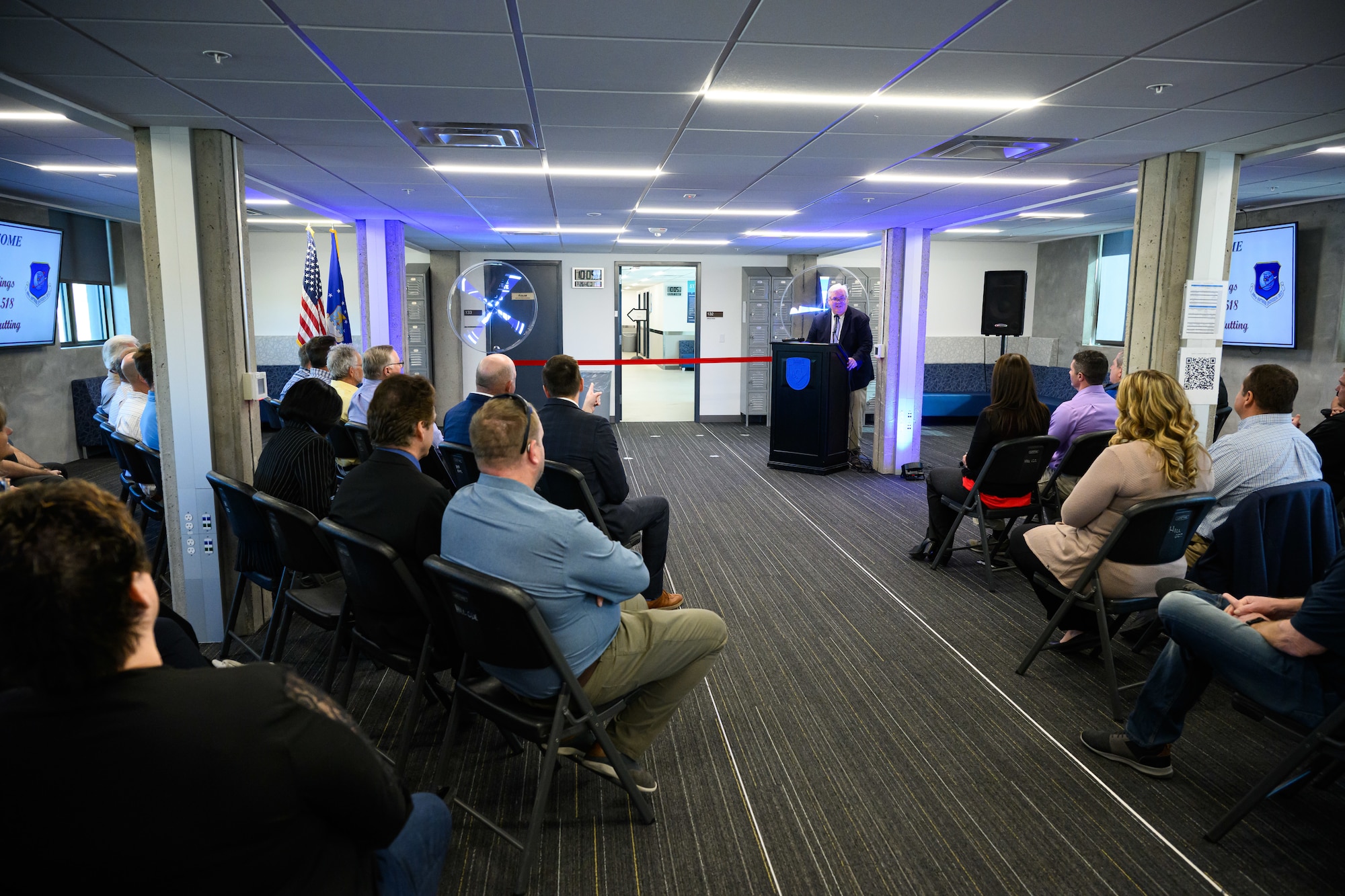 Enos Cummings, 309th Software Engineering Group director, speaks during a ribbon cutting ceremony for two new software training and onboarding facilities at Hill Air Force Base, Utah, March 26, 2025. The Launch Pad facility will help new hires awaiting security clearances enhance their skills and leadership, while SWEG U will provide ongoing training for 309th SWEG employees and software engineering groups from other bases. (U.S. Air Force photo by R. Nial Bradshaw)
