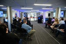 Enos Cummings, 309th Software Engineering Group director, speaks during a ribbon cutting ceremony for two new software training and onboarding facilities at Hill Air Force Base, Utah, March 26, 2025. The Launch Pad facility will help new hires awaiting security clearances enhance their skills and leadership, while SWEG U will provide ongoing training for 309th SWEG employees and software engineering groups from other bases. (U.S. Air Force photo by R. Nial Bradshaw)