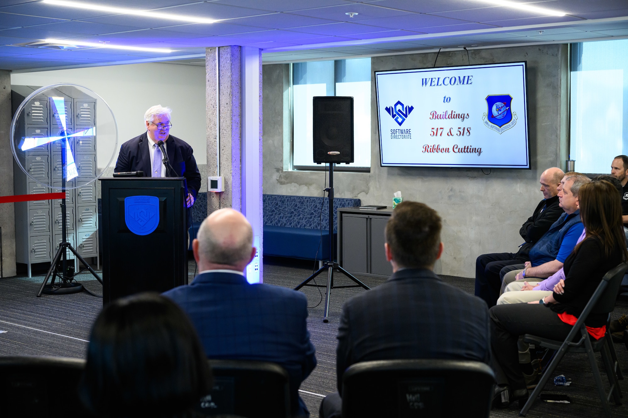 Enos Cummings, 309th Software Engineering Group director, speaks during a ribbon cutting ceremony for two new software training and onboarding facilities at Hill Air Force Base, Utah, March 26, 2025. The Launch Pad facility will help new hires awaiting security clearances enhance their skills and leadership, while SWEG U will provide ongoing training for 309th SWEG employees and software engineering groups from other bases. (U.S. Air Force photo by R. Nial Bradshaw)
