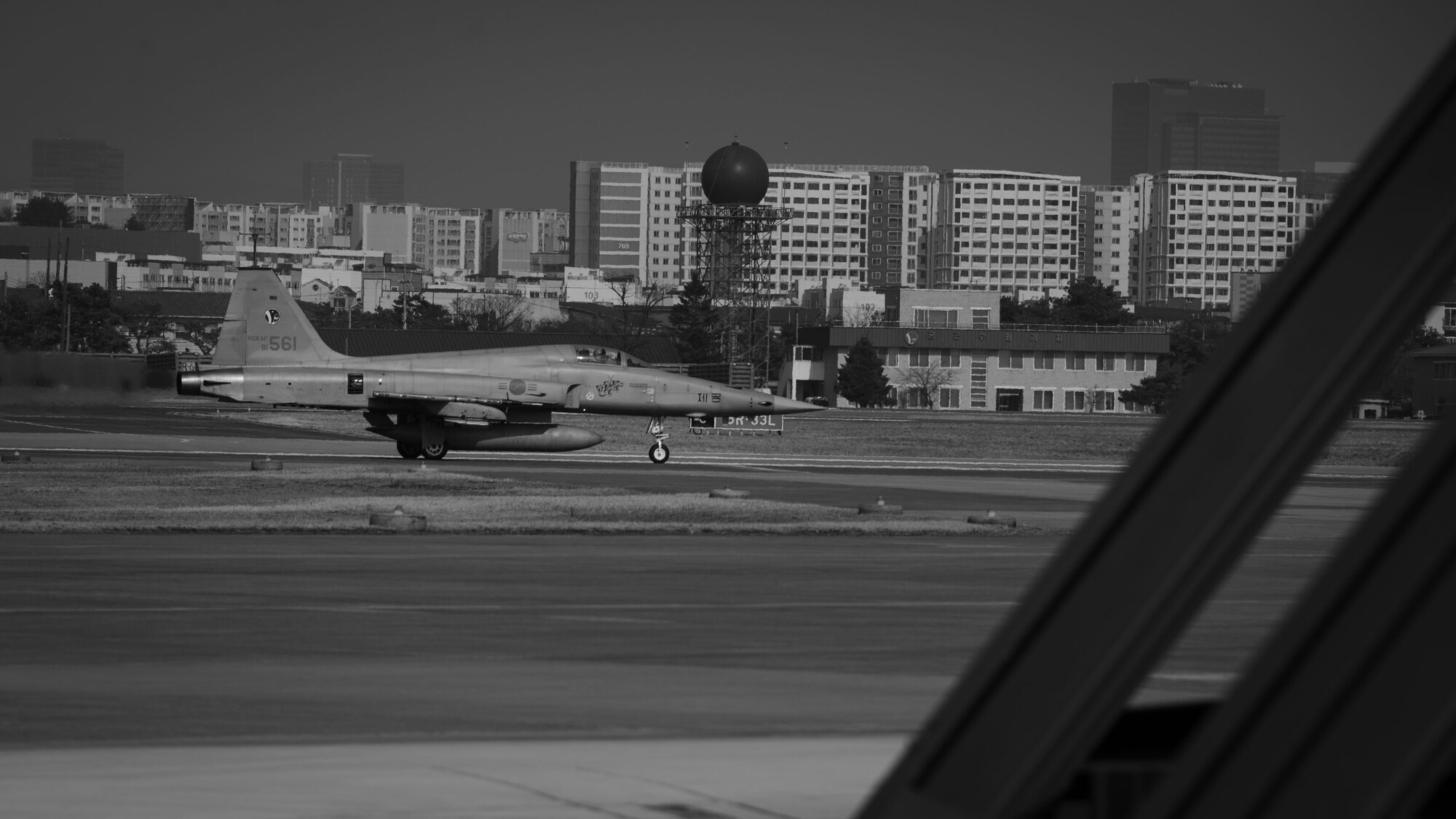 A Republic of Korea Air Force KF-5 aircraft assigned to the 10th Fighter Wing taxis down the runway during Freedom Shield 25 at Suwon Republic of Korea Air Base, March 11, 2025. Freedom Shield 25 training enabled Airmen to execute real-world scenarios within threat timelines, enhancing survivability, increasing flexibility for friendly forces, and complicating adversaries' targeting processes. (U.S. Air Force photo by Senior Airman Sabrina Fuller-Judd)