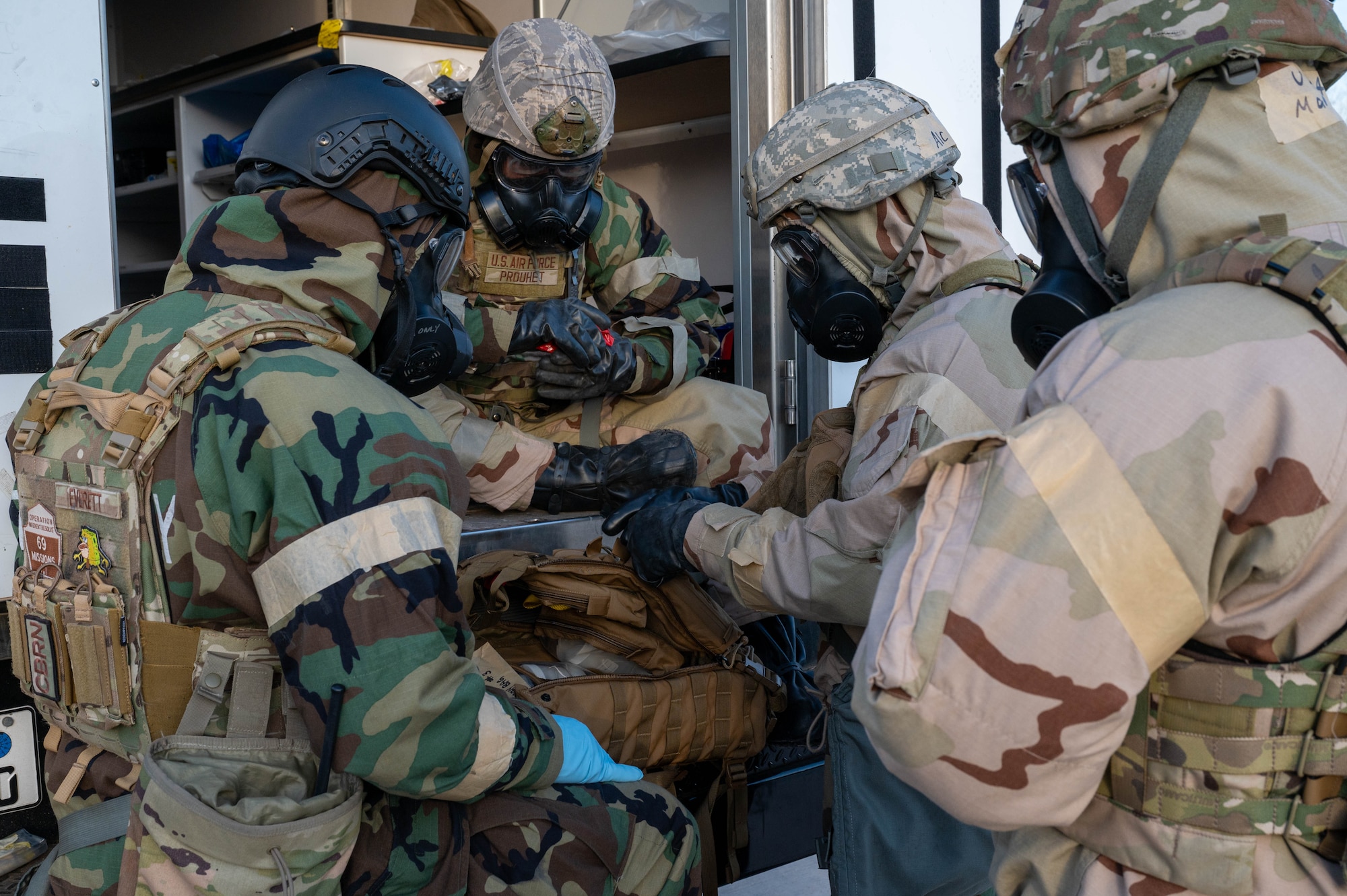 People prepare to respond to an unexploded ordnance