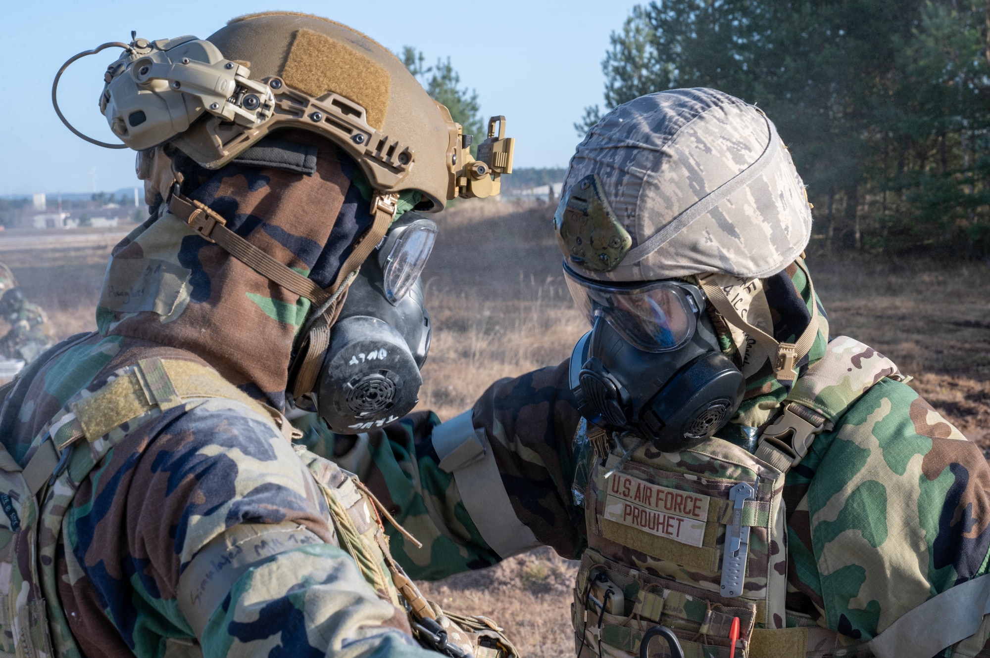 A person decontaminates another man