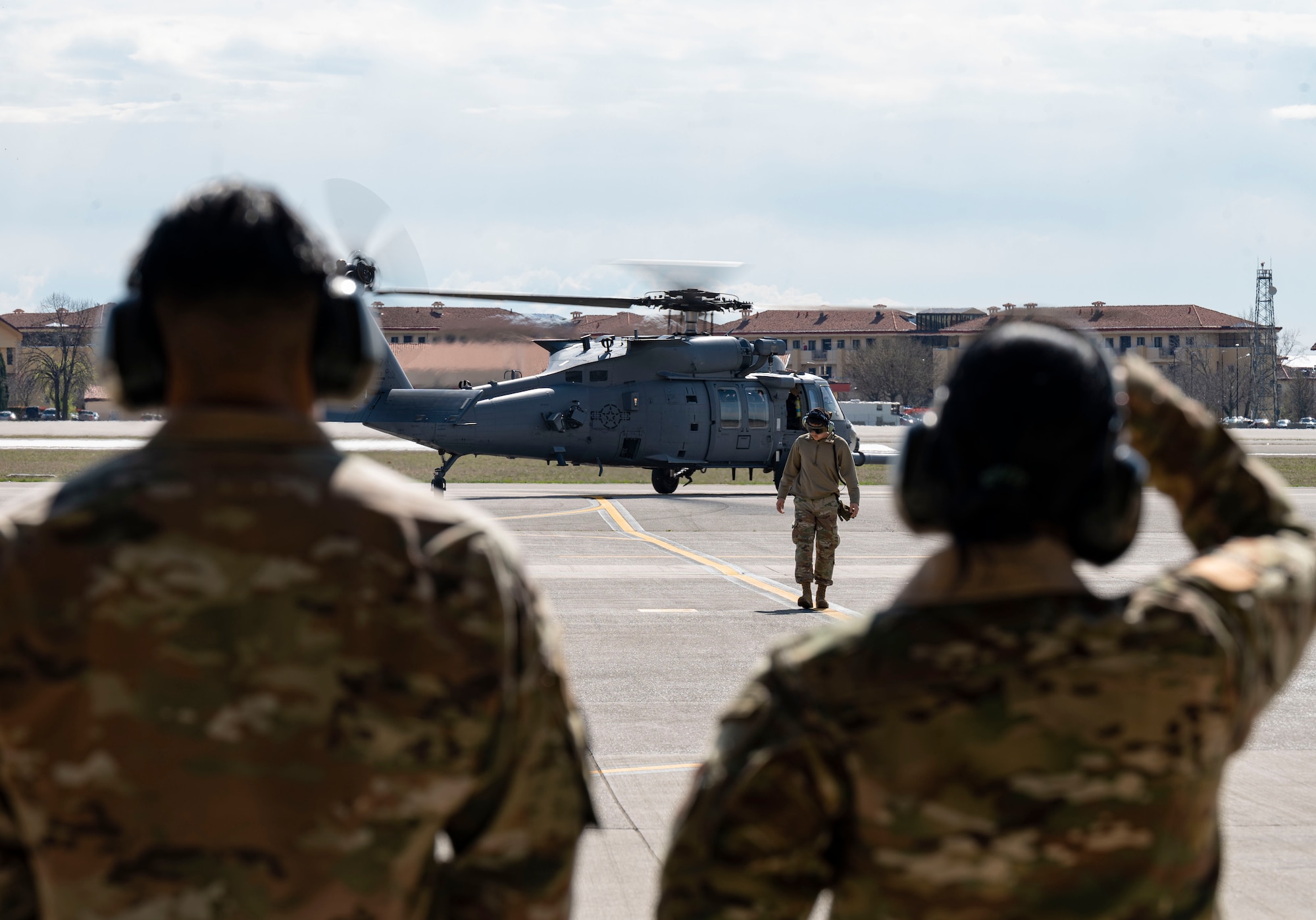 people looking and helicopter