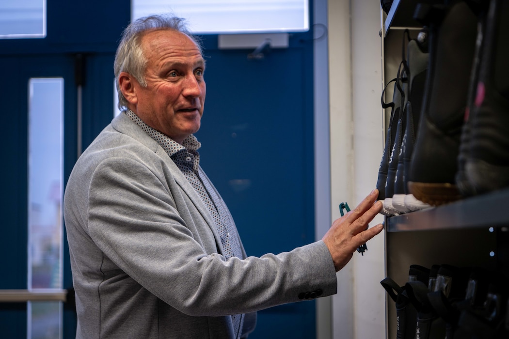 A participant of the host nation forum at Spangdahlem Air Base looks at an equipment shelf.