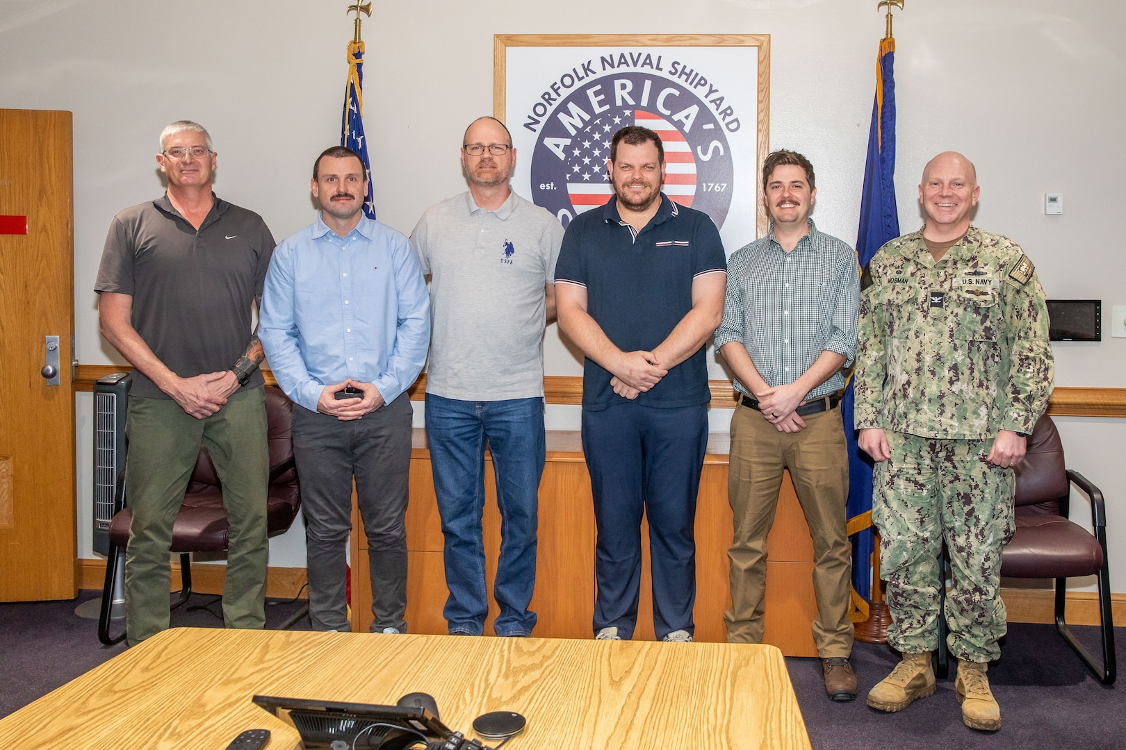 In a milestone for the AUKUS (Australia, United Kingdom, United States) enhanced trilateral security partnership, four Australian civilian maintenance technicians, pictured with Norfolk Naval Shipyard commander Capt. James Mosman, graduated from the U.S. Navy’s Radiological Controls Technician Qualifying School (RCTQS) at the Norfolk Naval Shipyard March 26, 2025.