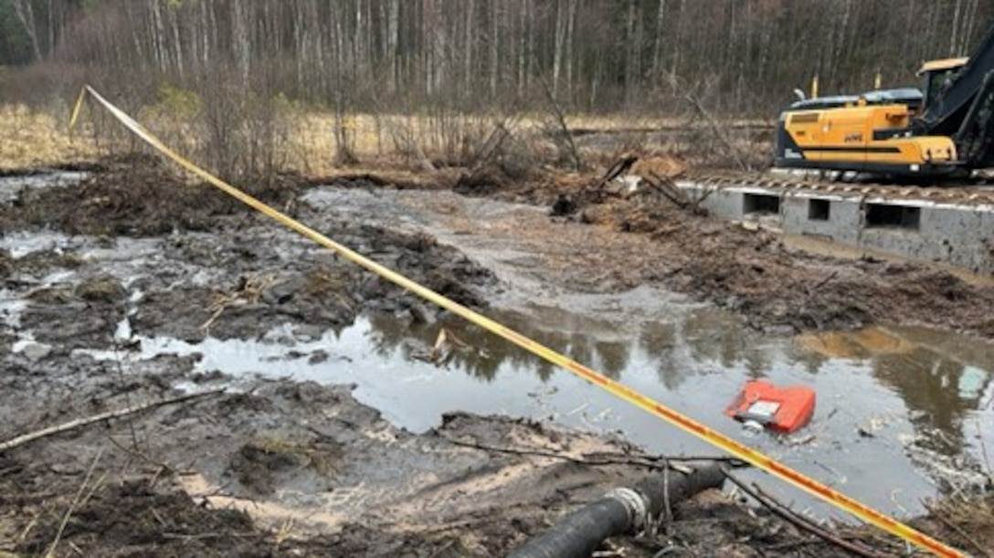 Lithuanian engineers and U.S. Soldiers work to pump water from a swamp to recover a U.S. Army M88 Hercules armored vehicle March 27 near Pabradė, Lithuania Lithuanians from across the country’s national and local government have aided U.S. Army Soldiers n the search for four missing U.S. Soldiers from 1st Brigade, 3rd Infantry Division and the subsequent recovery efforts of their M88 Hercules armored vehicle found submerged March 26 near the last known location of the Soldiers.
