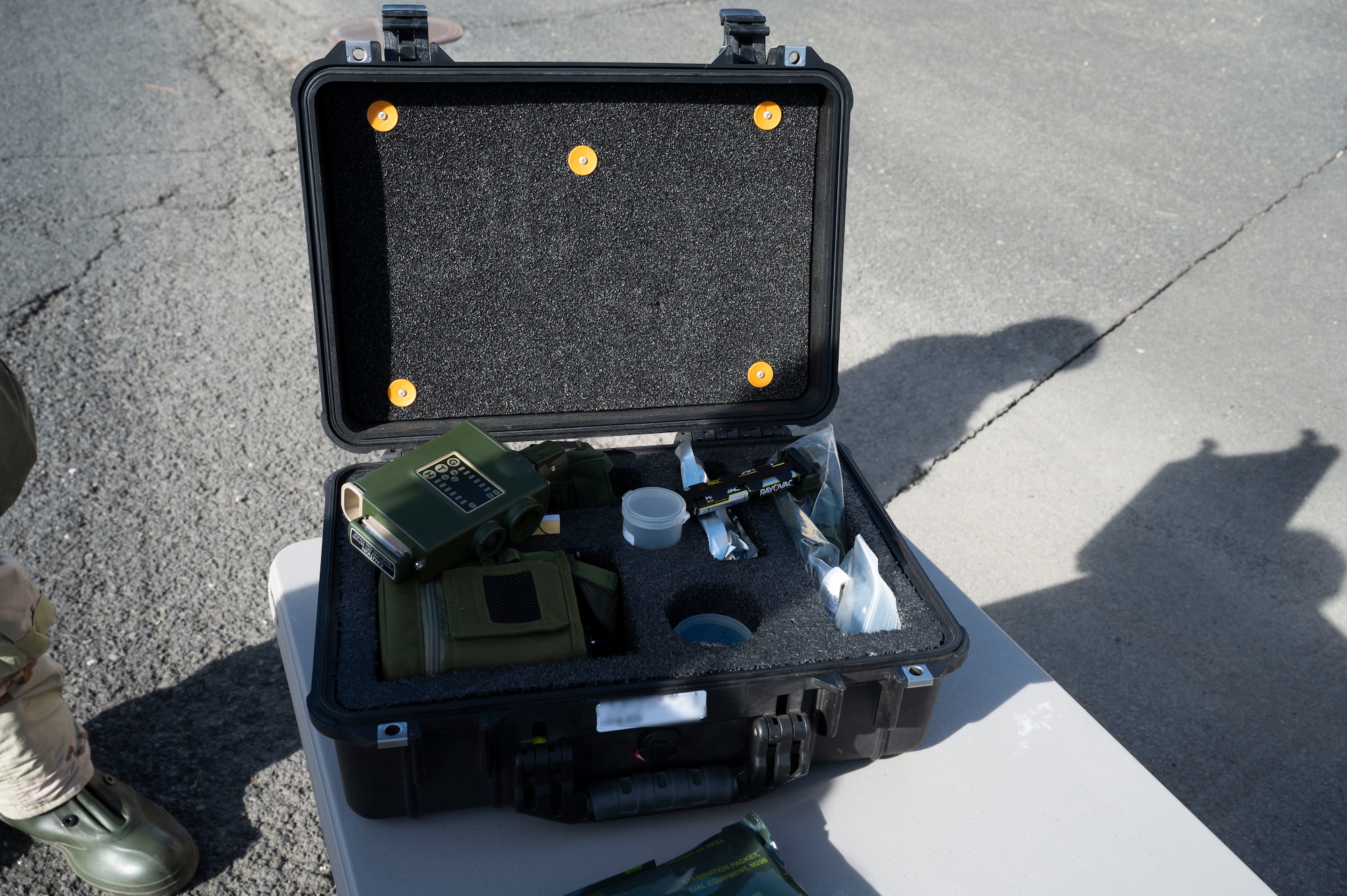 U.S. Air Force Airmen assigned to the 92nd Civil Engineer Squadron utilize a Joint Chemical Agent Detector at Fairchild Air Force Base, Washington, Feb. 22, 2025. The JCAD is a handheld device that detects the presence of chemical warfare agents and industrial chemical vapors. (U.S. Air Force photo by Airman 1st Class Samantha Thorn)