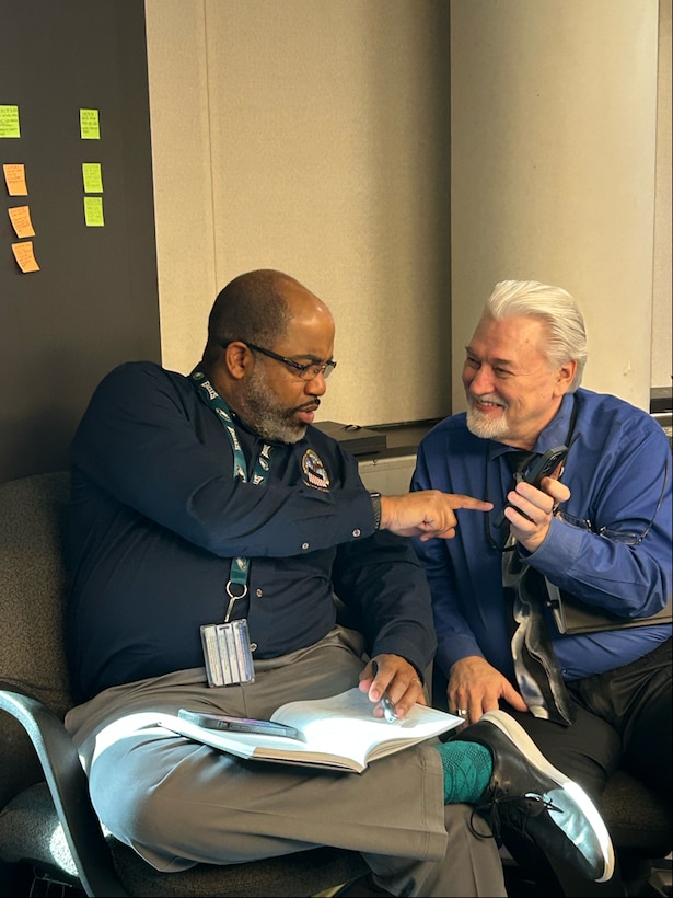 Two men talking