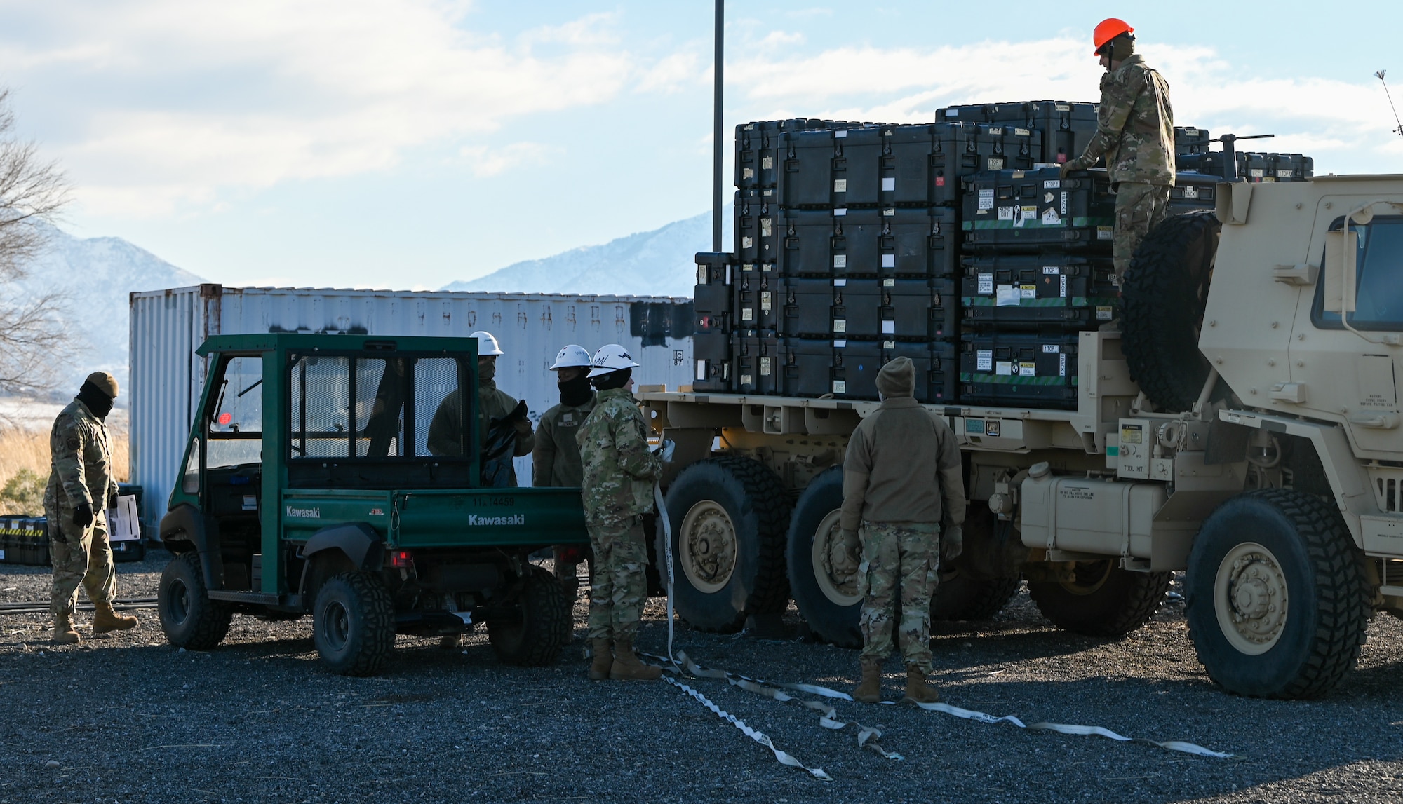 Airmen from the 729th Air Control Squadron coordinate the offloading of equipment at Hill Air Force Base, Utah, in preparation for upcoming exercises. The unit maintains a rapid deployment posture to ensure mission readiness.
(U.S. Air Force photo by Garrett N. Cole)