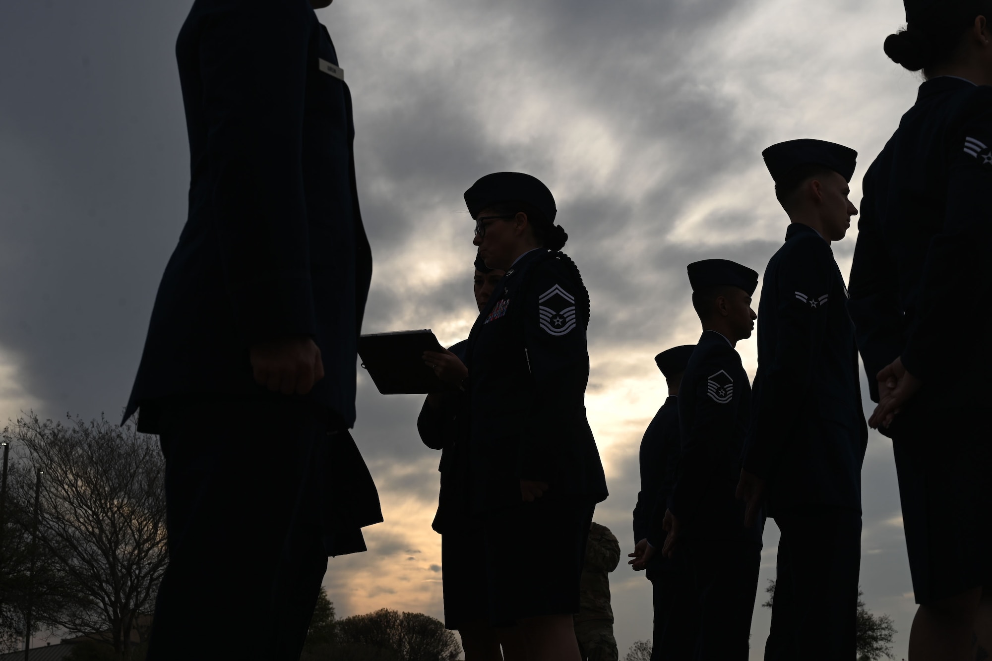 U.S. Air Force Senior Master Sgt. Jessica Dial, 17th Training Wing superintendent, military training instructor, and Senior Master Sgt. Crystal Doepker, 17th Comptroller Squadron senior enlisted leader, conduct a Standards and Readiness Review of the 17th CPTS outside the Norma Brown headquarters building, Goodfellow Air Force Base, Texas, March 26, 2025.The inspection was part of a wing-wide initiative to reaffirm dress and appearance standards, reinforcing discipline and readiness among 17th TRW Airmen. (U.S. Air Force photo by Senior Airman Evelyn J. D’Errico)