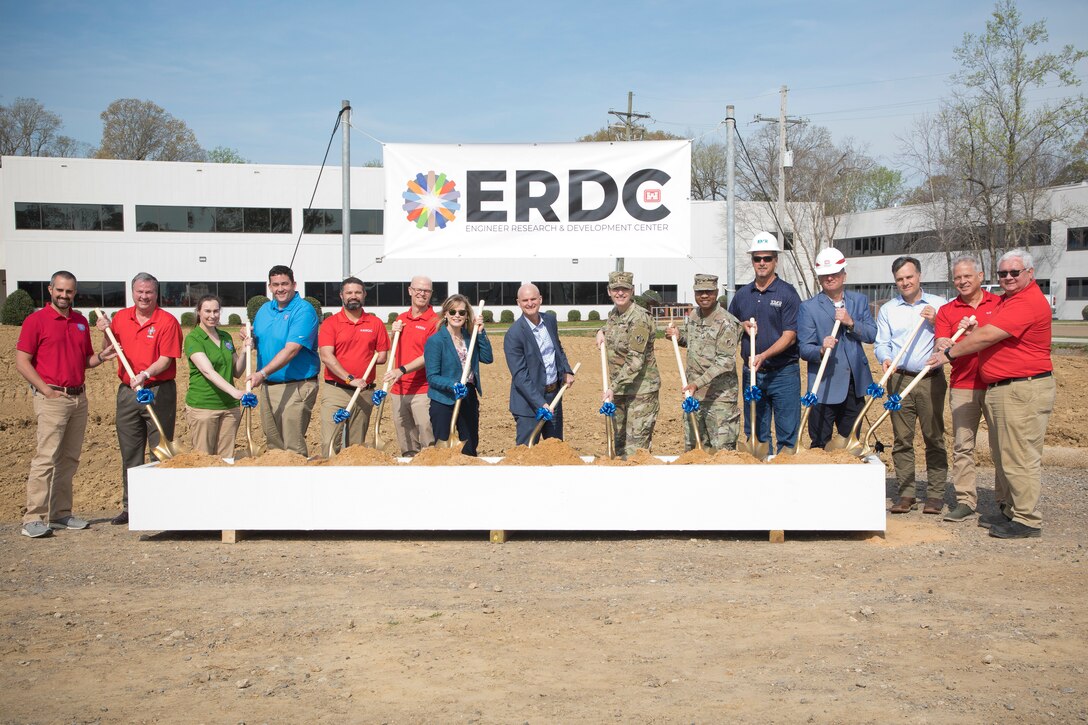 Participants shovel dirt at a groundbreaking ceremony for a new Watercraft and Ship Simulation Facility located at the U.S. Army Engineer Research and Development Center’s Coastal and Hydraulics Laboratory in Vicksburg, Miss., March 27, 2025.