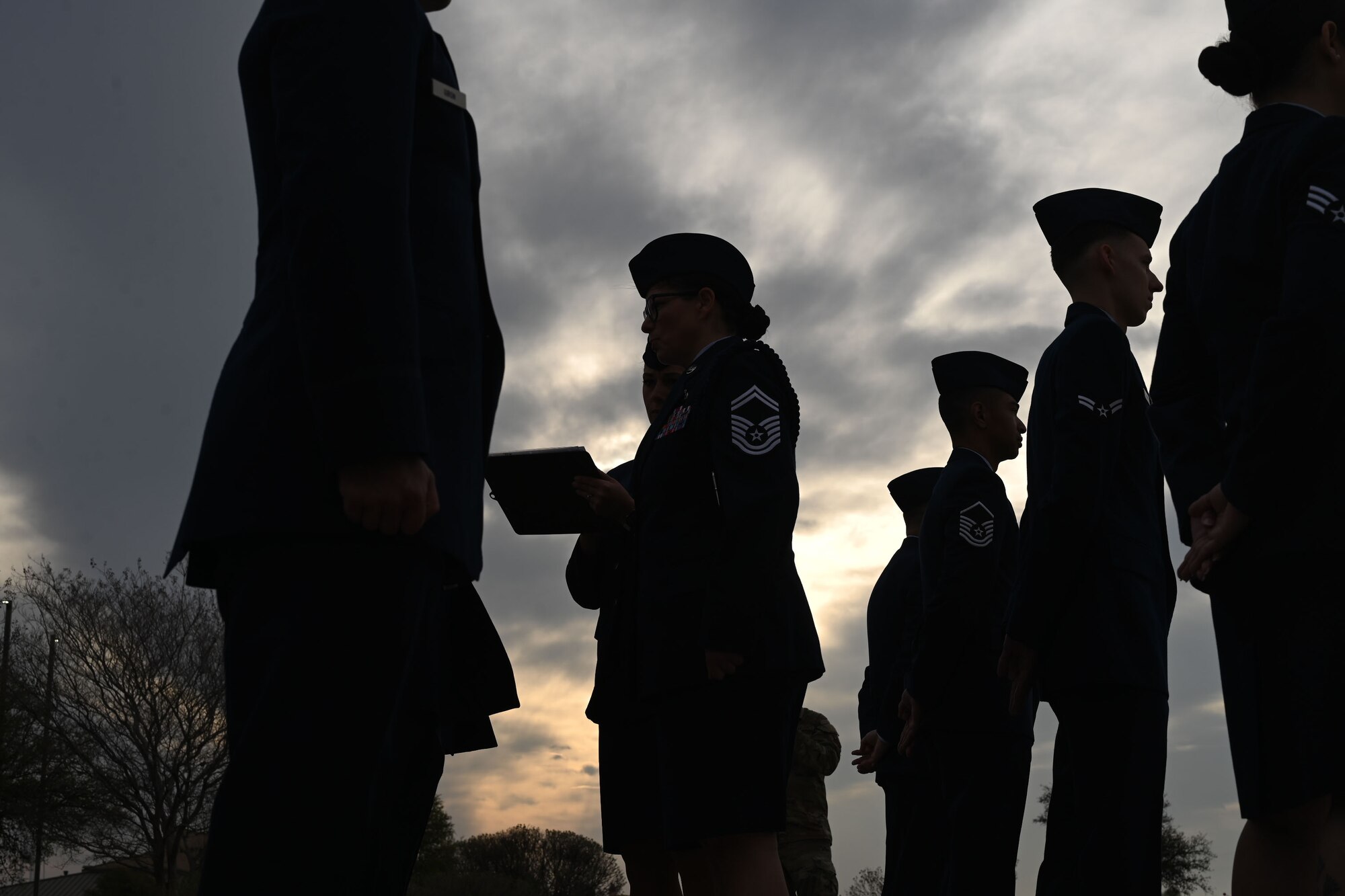 U.S. Air Force Senior Master Sgt. Jessica Dial, 17th Training Wing superintendent, military training instructor, and Senior Master Sgt. Crystal Doepker, 17th Comptroller Squadron senior enlisted leader, conduct a Standards and Readiness Review of the 17th CPTS outside the Norma Brown headquarters building, Goodfellow Air Force Base, Texas, March 26, 2025.The inspection was part of a wing-wide initiative to reaffirm dress and appearance standards, reinforcing discipline and readiness among 17th TRW Airmen. (U.S. Air Force photo by Senior Airman Evelyn J. D’Errico)