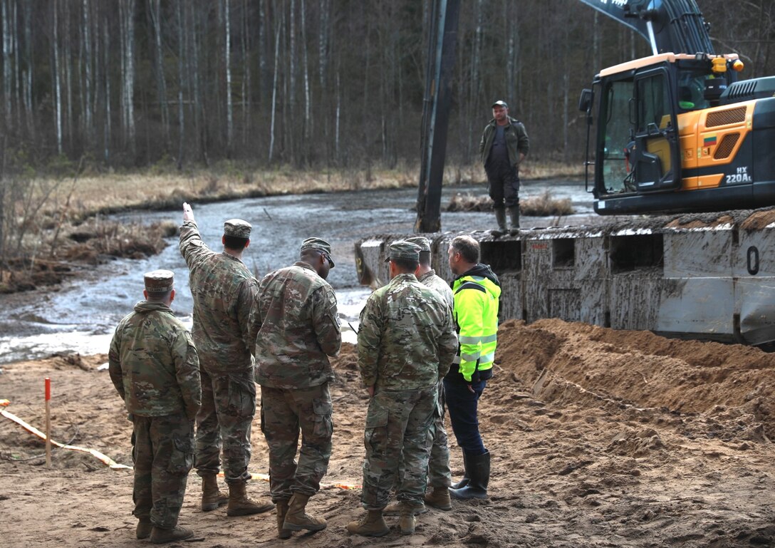 Recovery Efforts Continue at Site of Submerged Vehicle in Search for Missing Soldiers