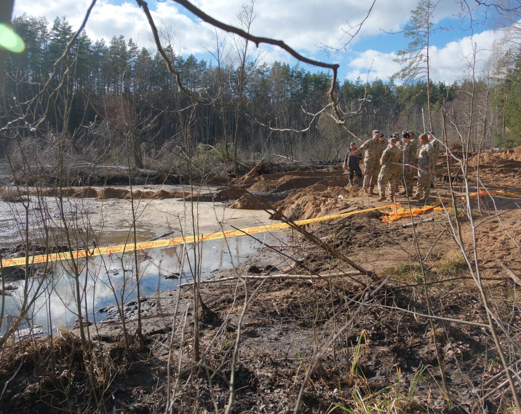 Recovery Efforts Continue at Site of Submerged Vehicle in Search for Missing Soldiers