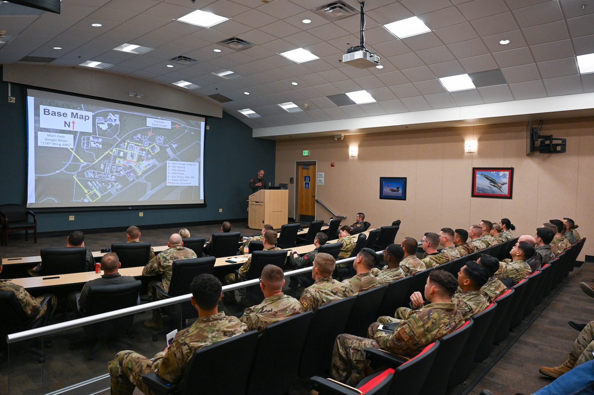 U.S. Air Force Airmen from the 178th Wing participate in a briefing with Airmen from the 163rd Attack Wing and 248th Air Traffic Control Squadron during Exercise Advanced Wrath at Springfield-Beckley Air National Guard Base, Ohio, March 6, 2024. The briefing discussed an overview of exercise mission operations in preparation for an MQ-9 Reaper arrival onto the base. (U.S. Air National Guard photo by Senior Airman Constantine Bambakidis)