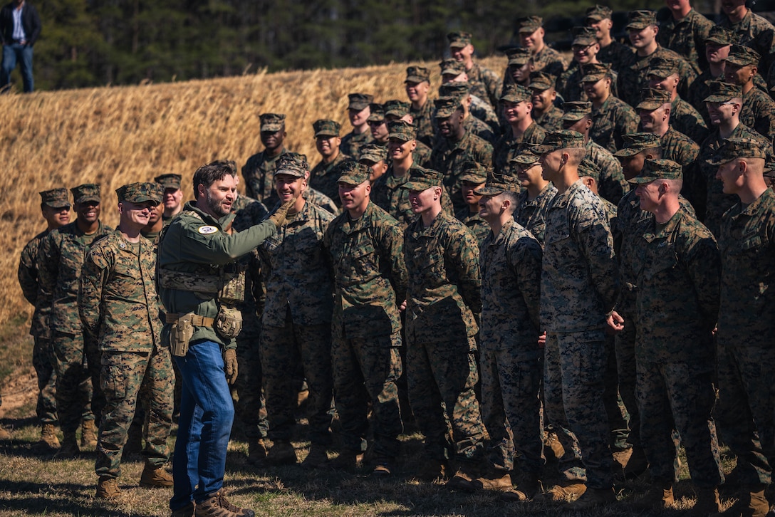 JD Vance, the Vice President of the United States, speaks to U.S. Marines with Weapons Training Battalion after a live-fire range at WTBn on Marine Corps Base Quantico, Virginia, March 26, 2025. Vance served in the Marine Corps as a combat correspondent, including a deployment to Iraq in support of Operation Iraqi Freedom. The purpose of his visit was to engage with Marines, reconnect with the Corps, and experience firsthand the training that shapes the next generation of Marines. (U.S. Marine Corps photo by Cpl. Joaquin Dela Torre)