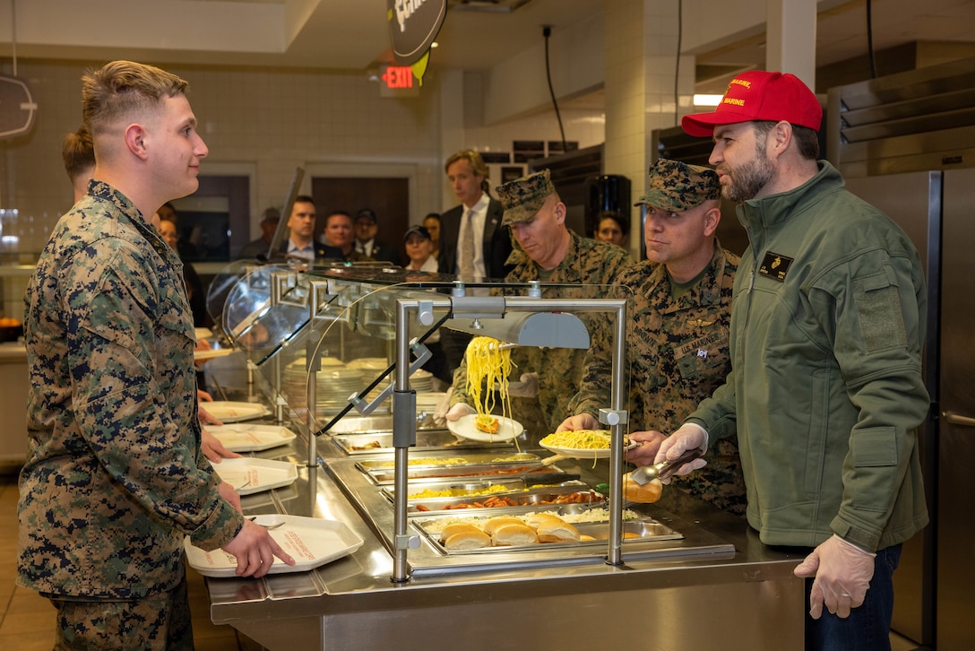The 50th U.S. Vice President JD Vance serves Marines food at Dwyer Hall mess facility at Marine Corps Air Facility on Marine Corps Base Quantico, Virginia, March 26, 2025. Vance, who previously served as an active-duty, combat correspondent Marine, visited MCB Quantico and some of its 27 tenant commands to understand the operations of base, which serves as the bed of innovation and education for the Corps and the future of warfare. (U.S. Marine Corps photo by Lance Cpl. Federico Marquez)