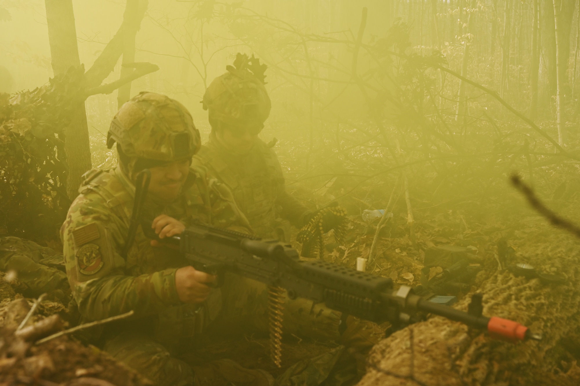U.S. Airmen assigned to the 178th Security Forces Squadron, Ohio National Guard defend their fighting position against a simulated enemy attack Feb. 4, 2025 during annual training at Camp Holland in Butlerville, Indiana. The training, primarily focused on mission planning, included attacking and defending positions and aligning tactics with the Air Force doctrine of Agile Combat Employment. (U.S. Air National Guard photo by Shane Hughes)