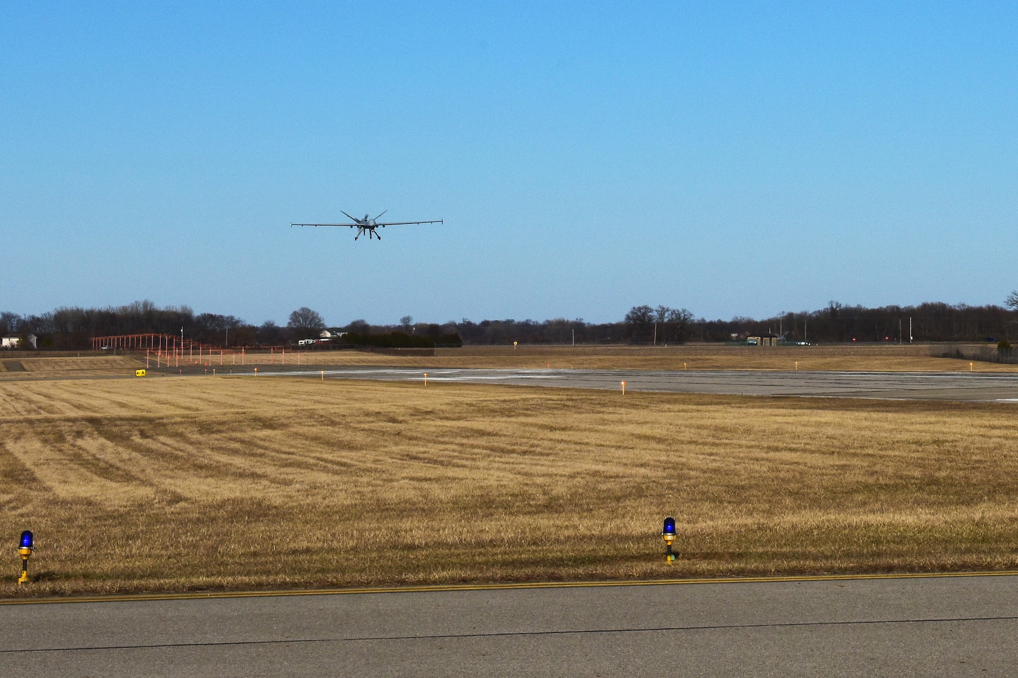 A U.S. Air Force MQ-9 Reaper lands at Springfield-Beckley Air National Guard Base in Springfield, Ohio on Mar. 3, 2025. The MQ-9 arrived for Advanced Wrath, a two-week exercise supporting U.S. Special Operations Command, U.S. Coast Guard search and rescue operations, and testing for the Air Force Research Laboratory. (U.S. Air National Guard photo by Shane Hughes)