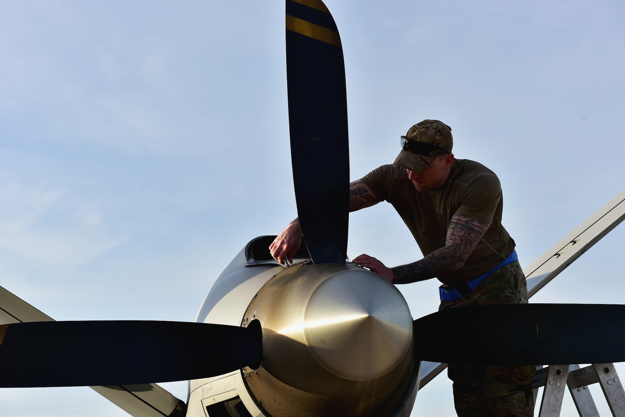 U.S. Air Force Tech. Sgt. Brien Disbro, a crew chief assigned to the174th Attack Wing, performs post-flight maintenance on an MQ-9 Reaper on Mar. 10, 2025  at Springfield-Beckley Air National Guard Base in Springfield, Ohio. The MQ-9 arrived for Advanced Wrath, a two-week exercise supporting U.S. Special Operations Command, U.S. Coast Guard search and rescue operations, and testing for the Air Force Research Laboratory. (U.S. Air National Guard photo by Shane Hughes)